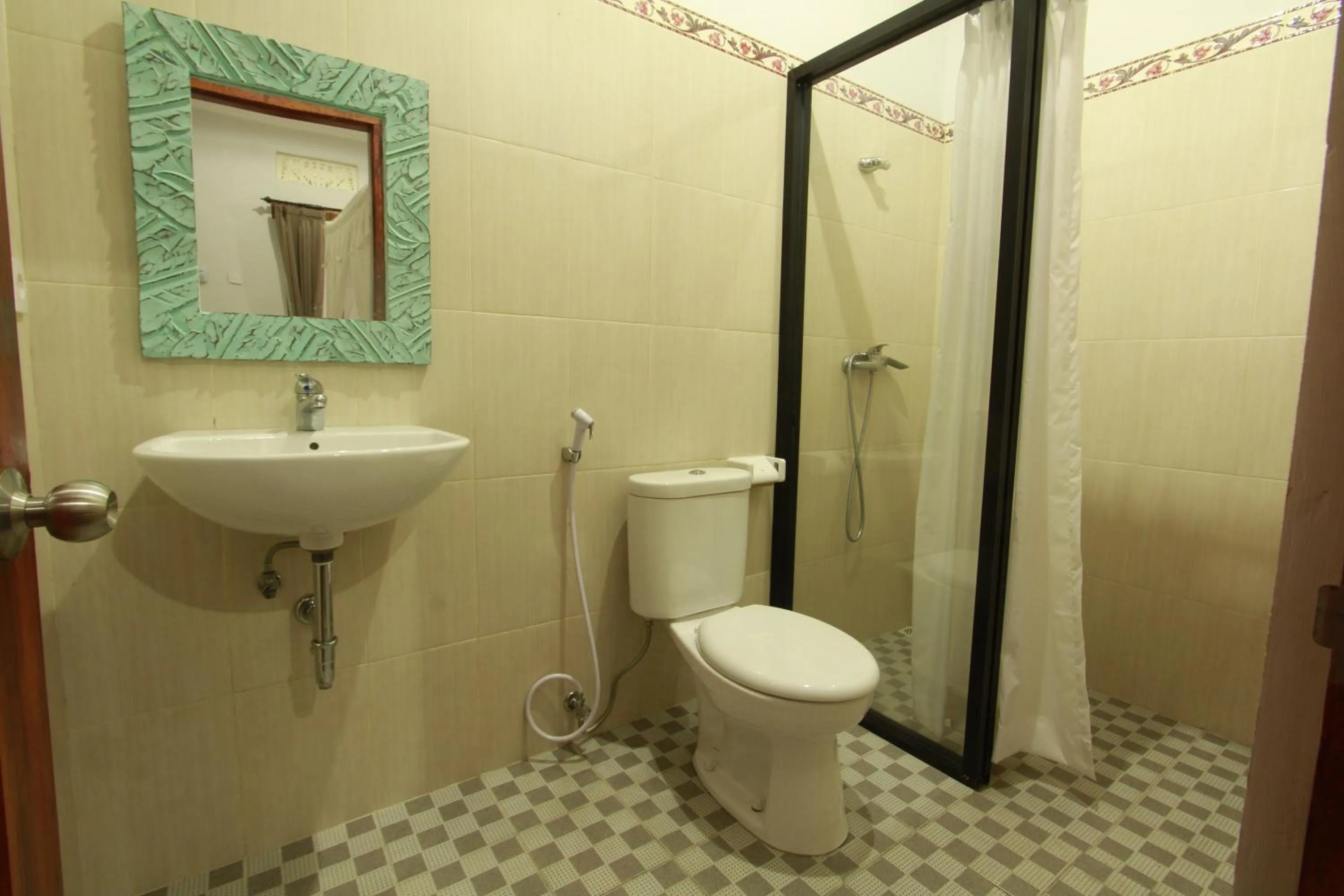 Bathroom in Suryadina Guest House