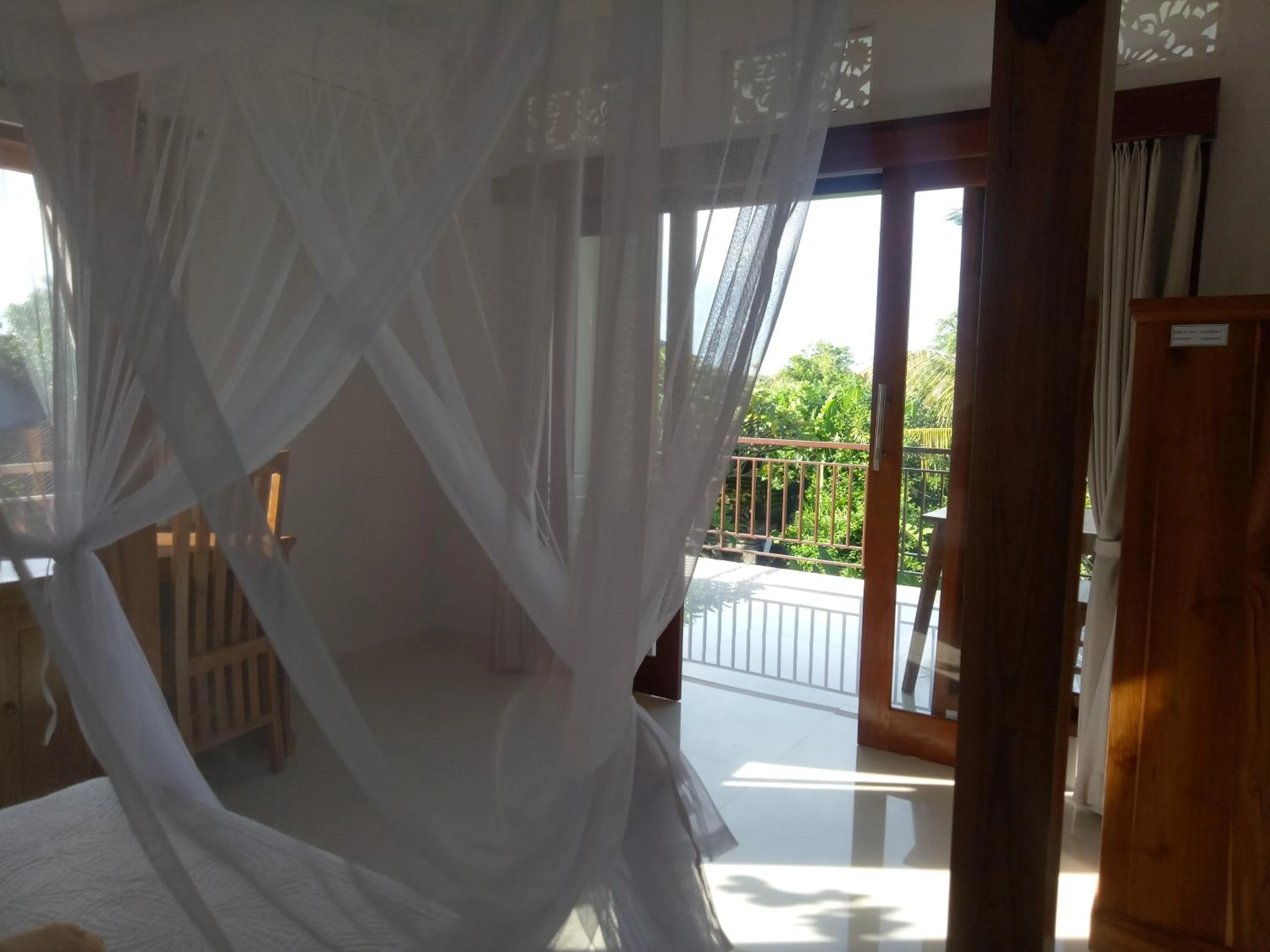 Bed in Suryadina Guest House