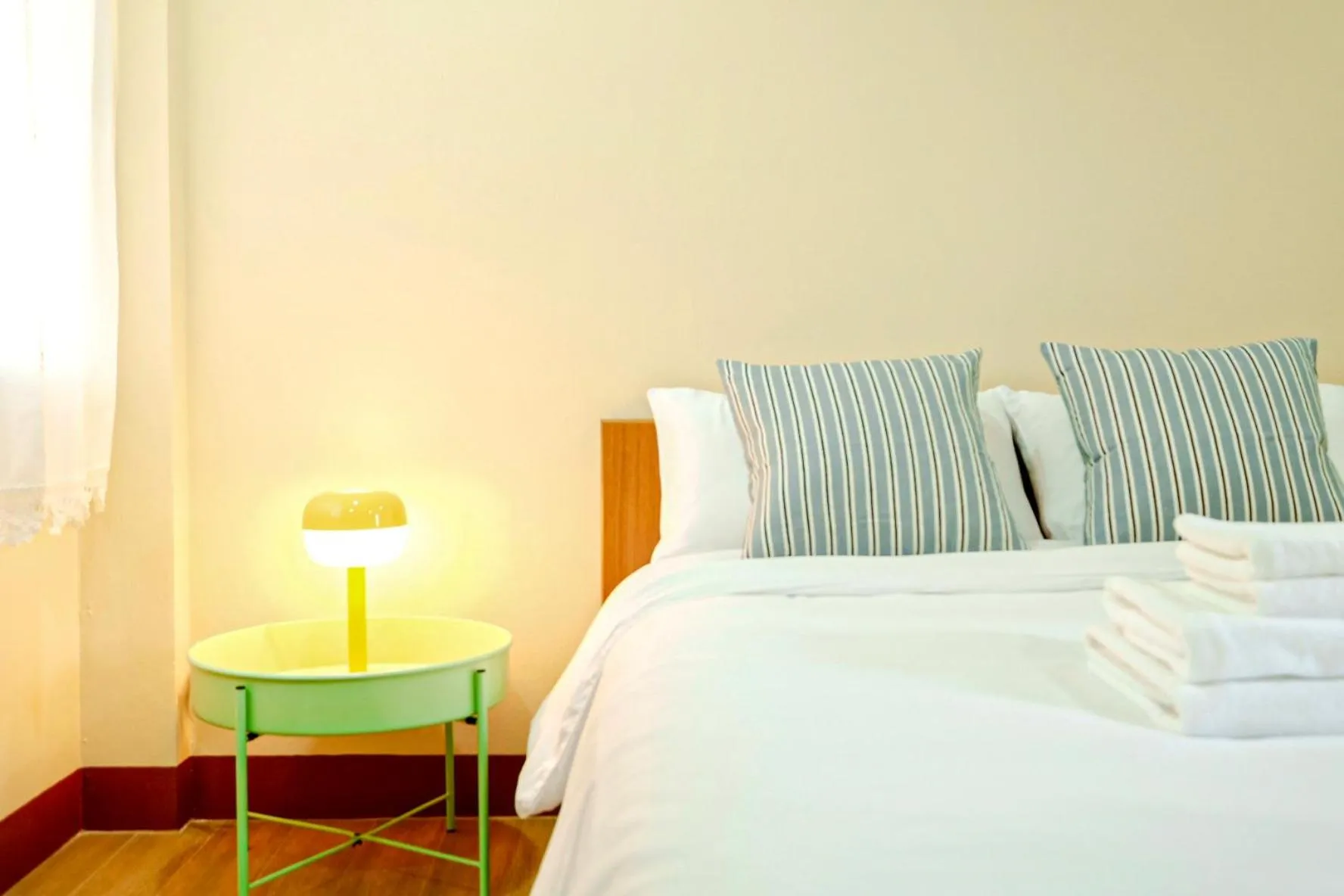 Bed in Thong Poon Apartment Chiang Mai