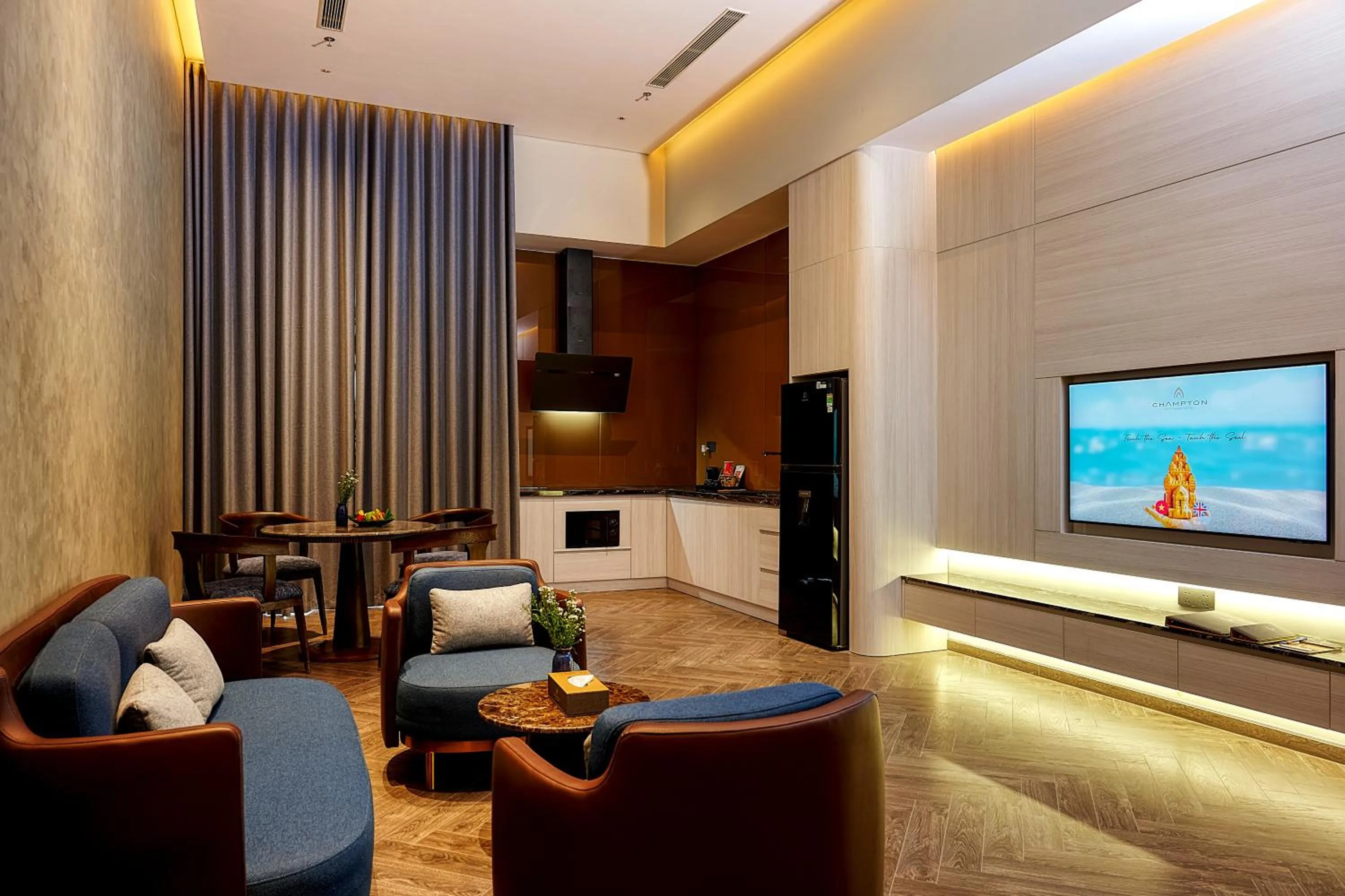 Communal lounge/ TV room in Champton Nha Trang Hotel
