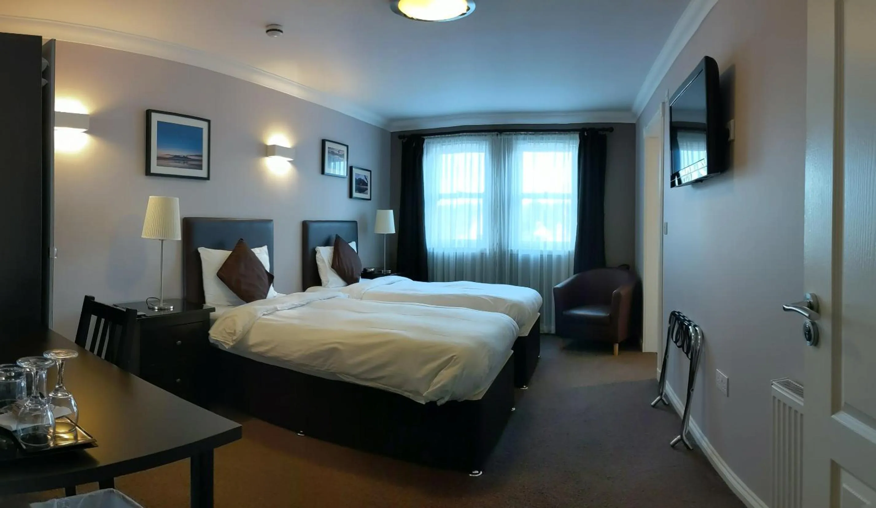 Bed in MacLean Guest House