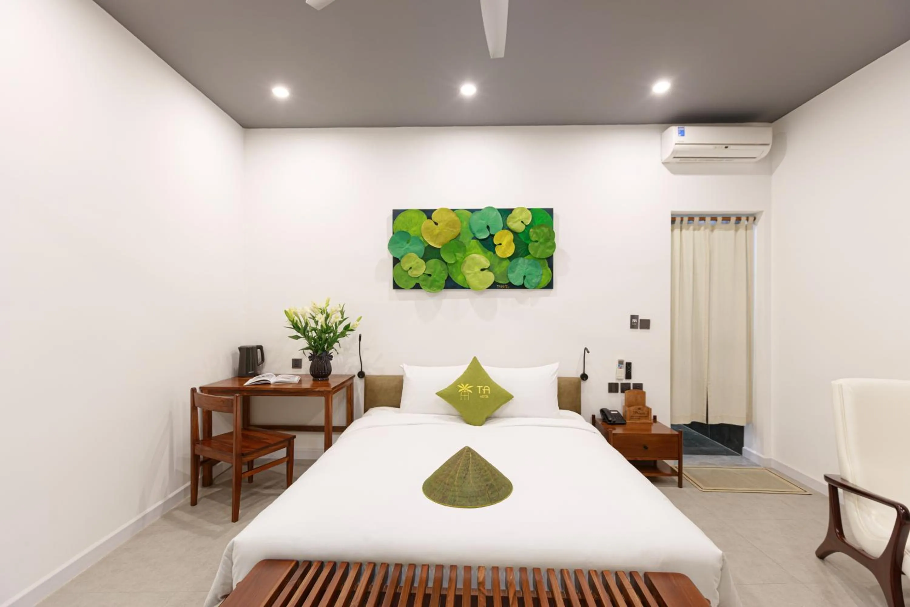 Photo of the whole room, Bed in TA Hue Boutique Hotel