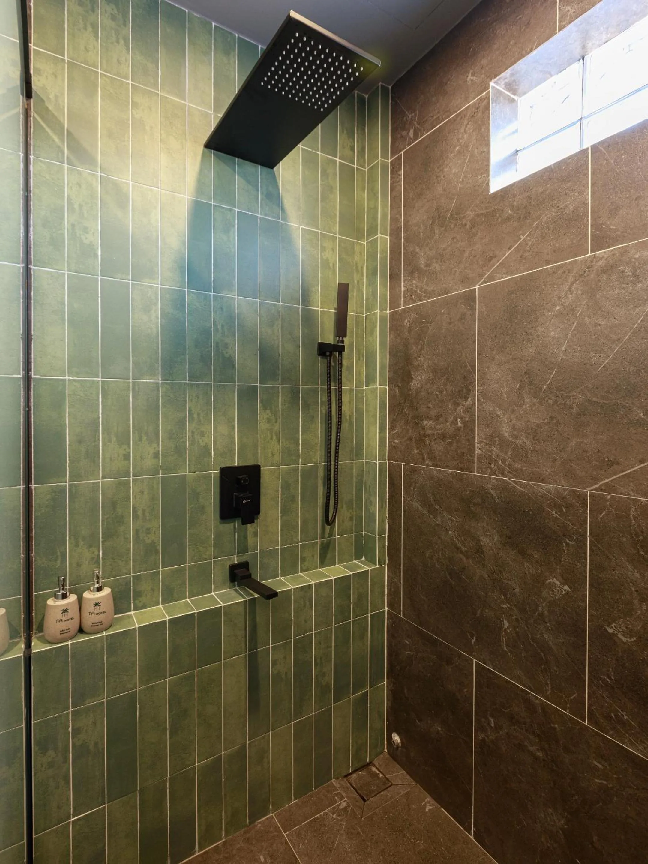 Shower in TA Hue Boutique Hotel