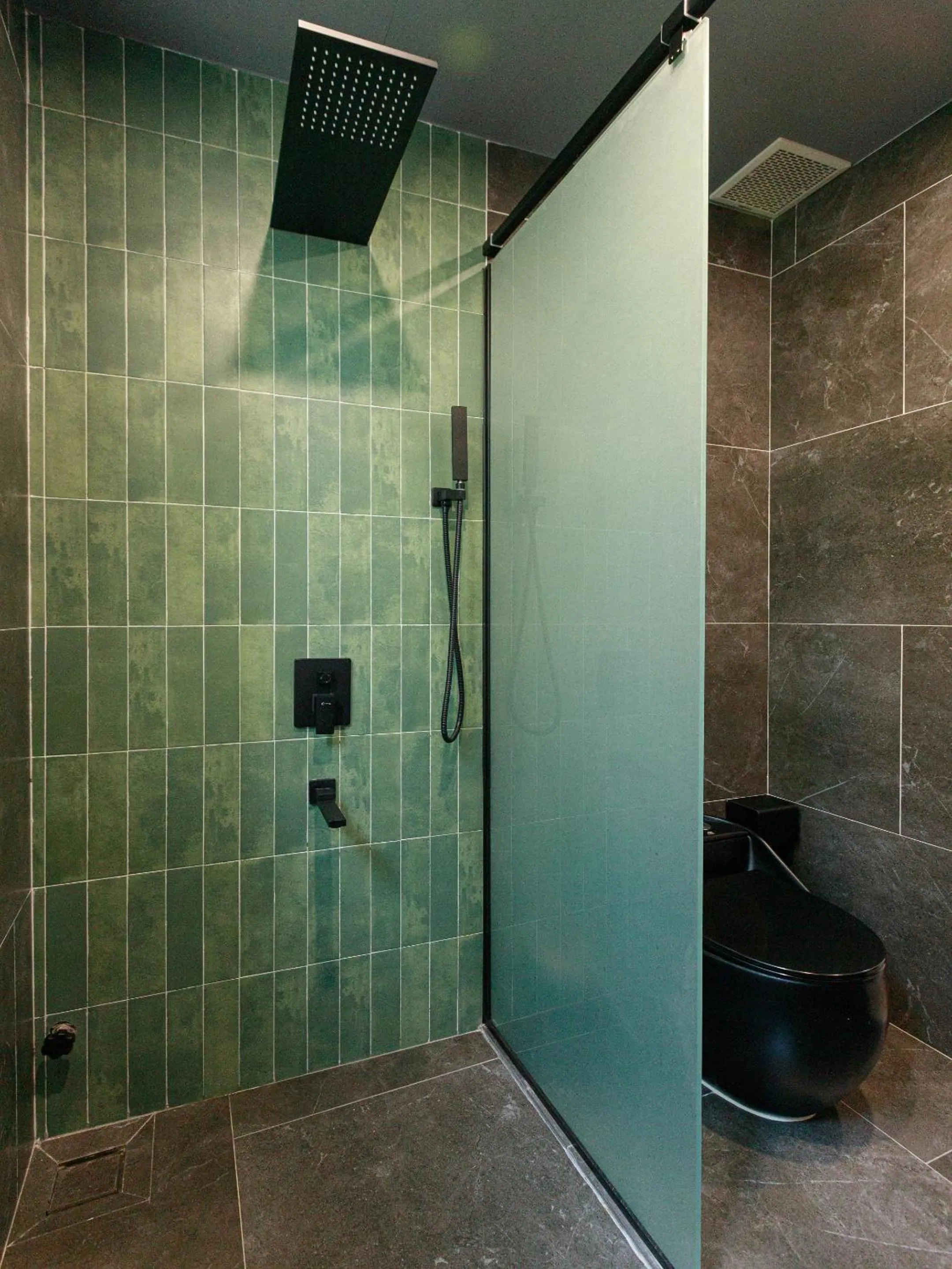 Shower in TA Hue Boutique Hotel