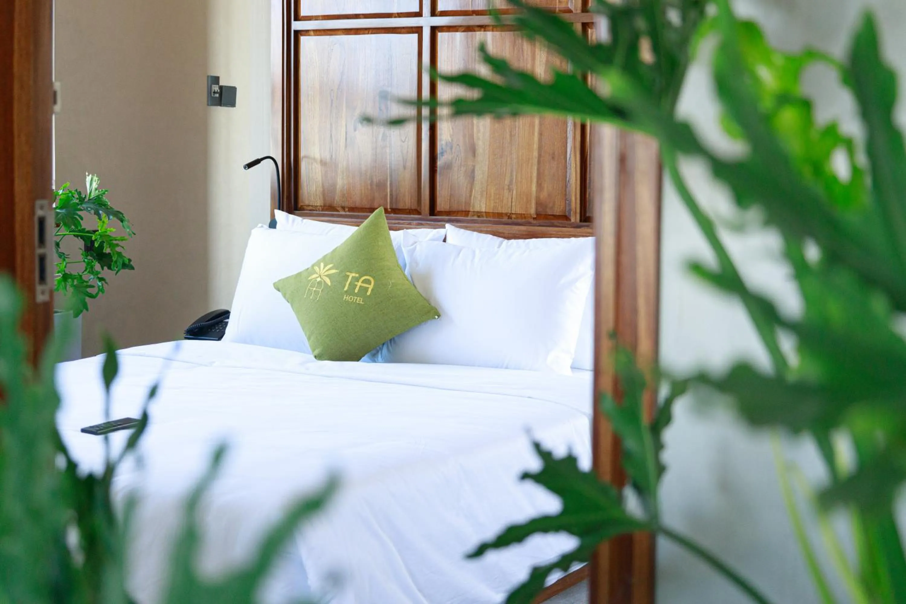 Bed in TA Hue Boutique Hotel