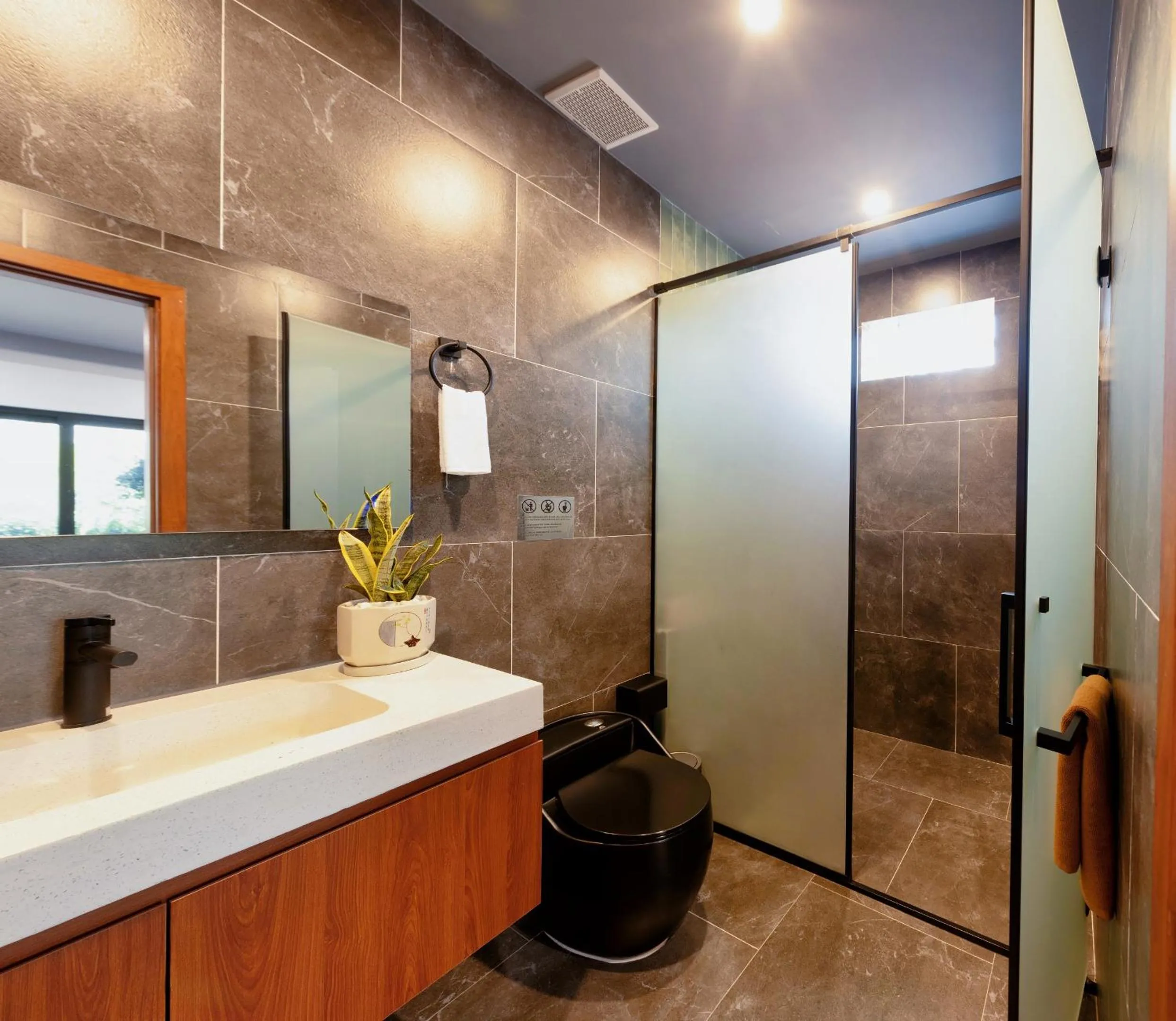 Shower in TA Hue Boutique Hotel