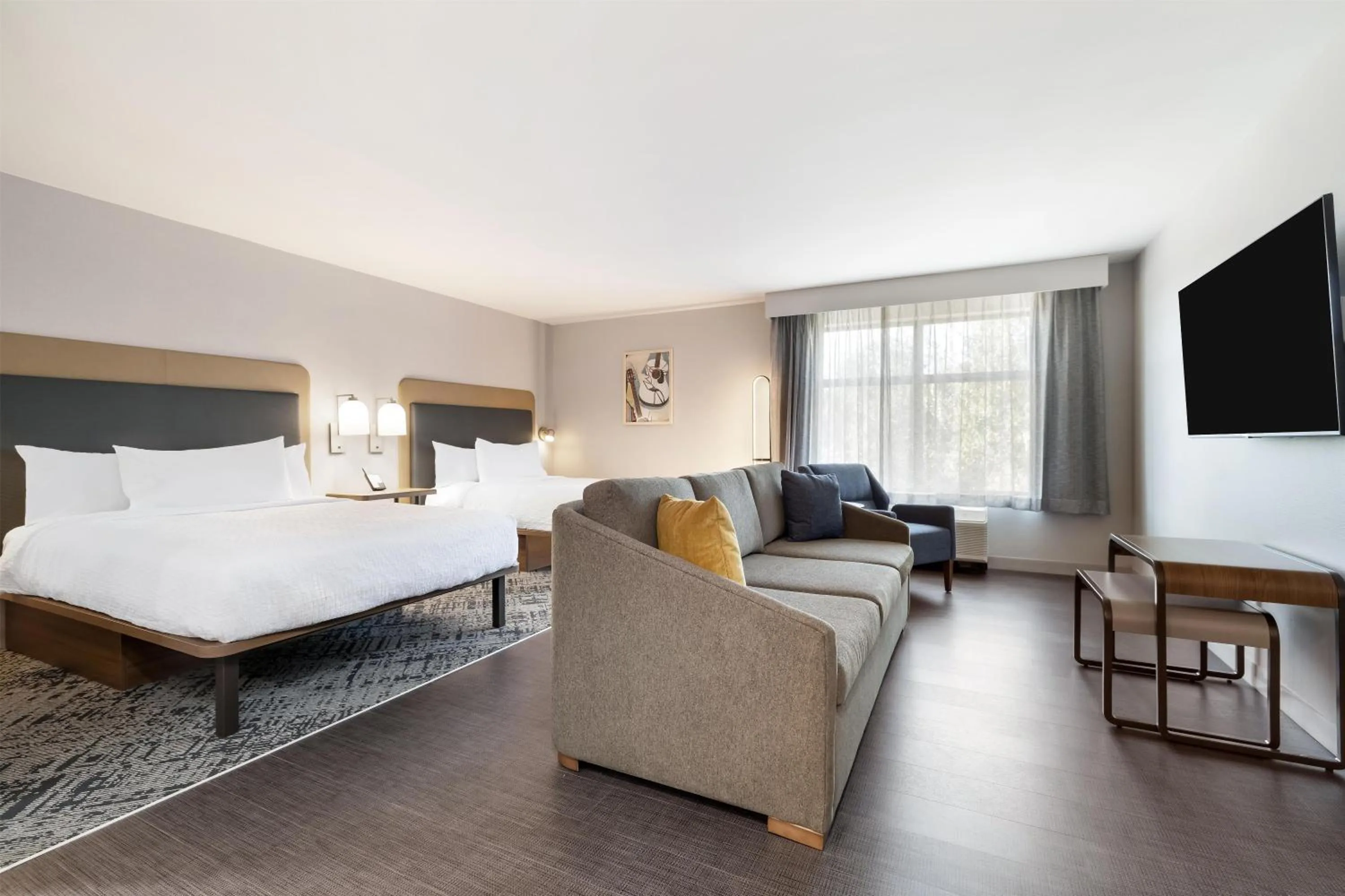 Living room, Bed in Homewood Suites By Hilton Austin Airport