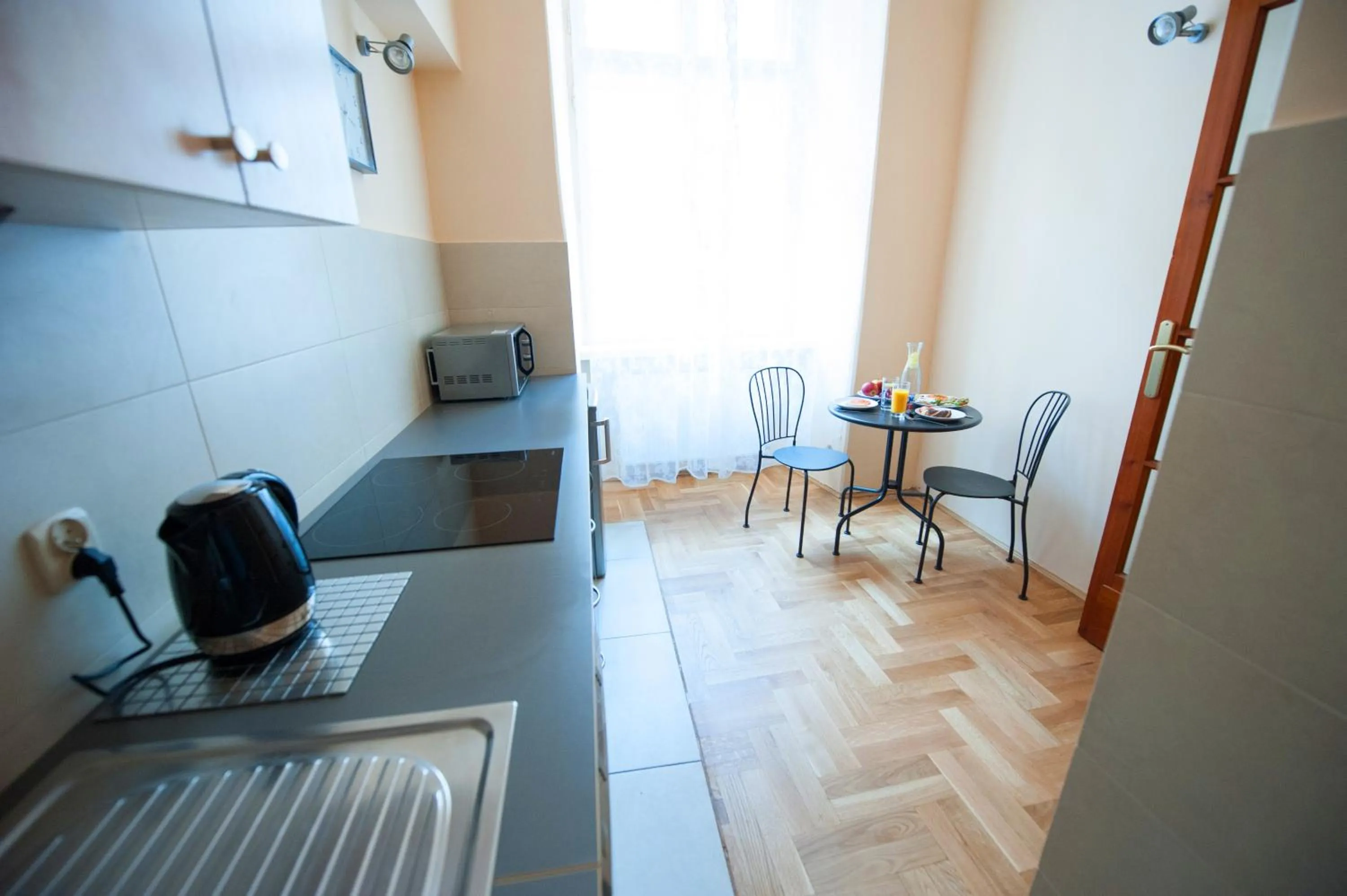 Kitchen or kitchenette in Apartments Roman