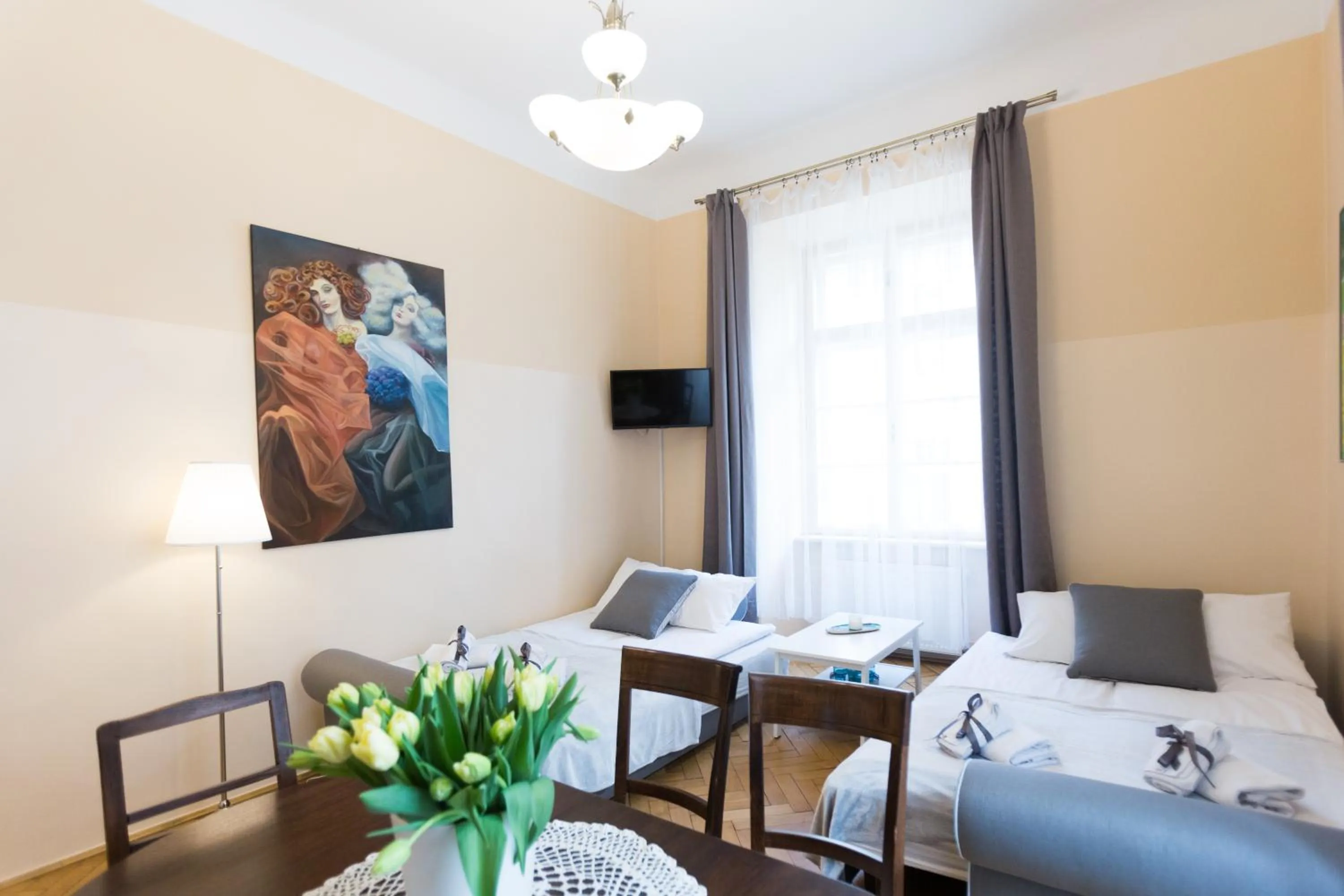 Seating area, Bed in Apartments Roman