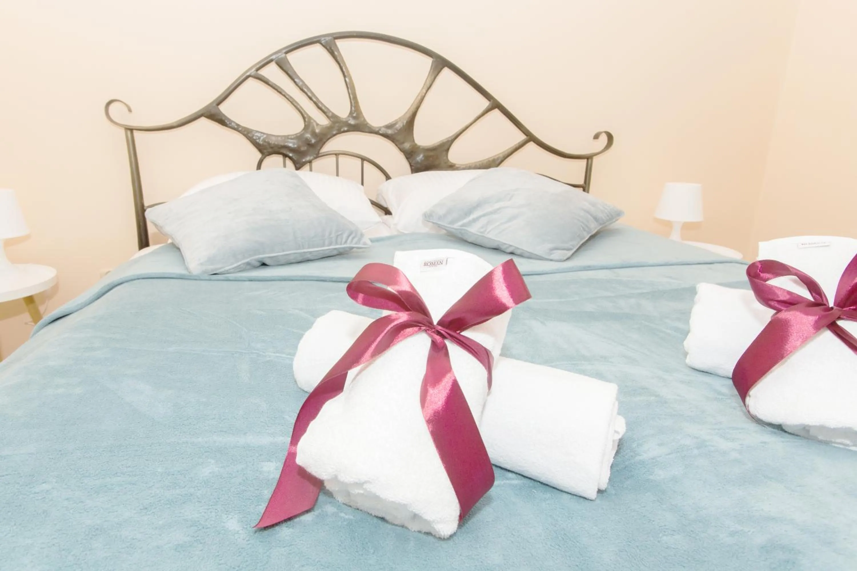 Bed in Apartments Roman