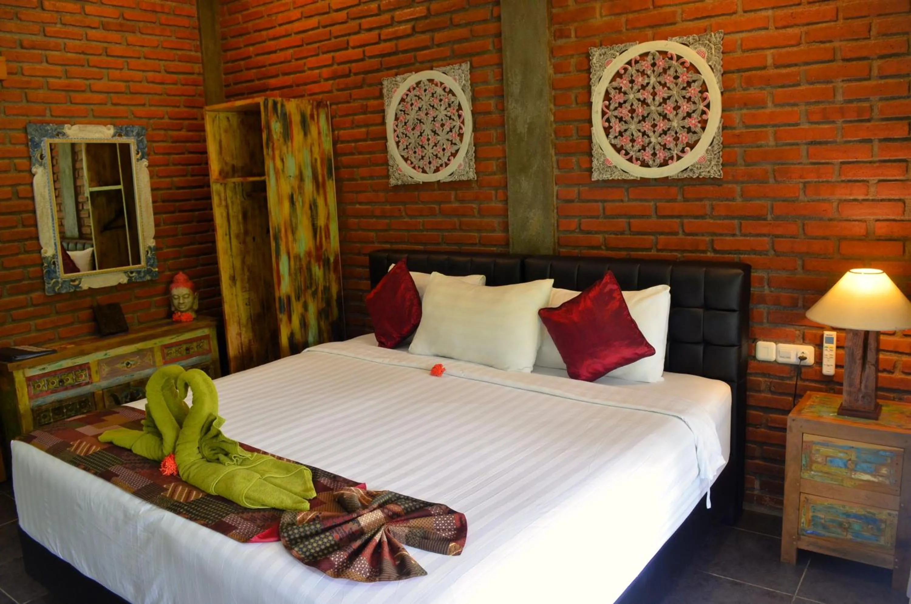 Bed in Alamanda Lovina Resort