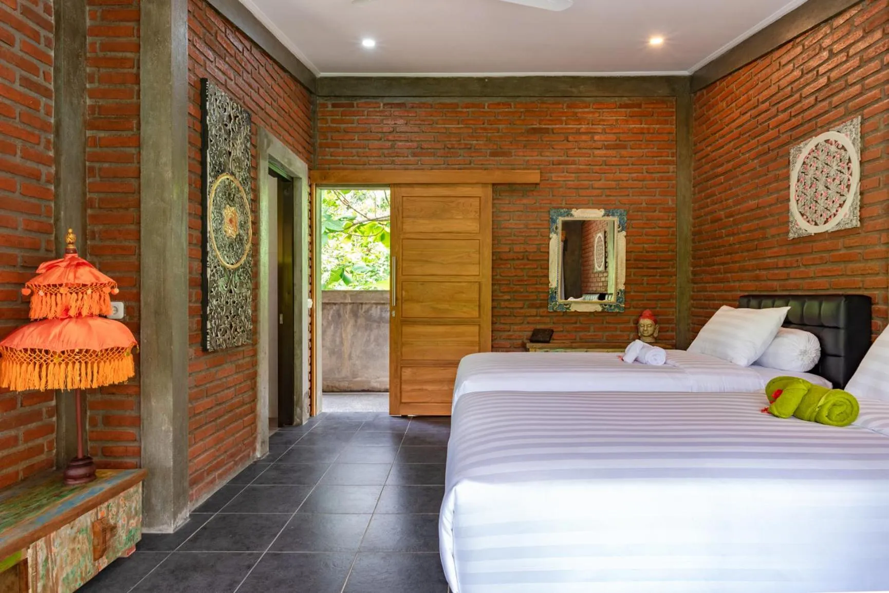 Bed in Alamanda Lovina Resort