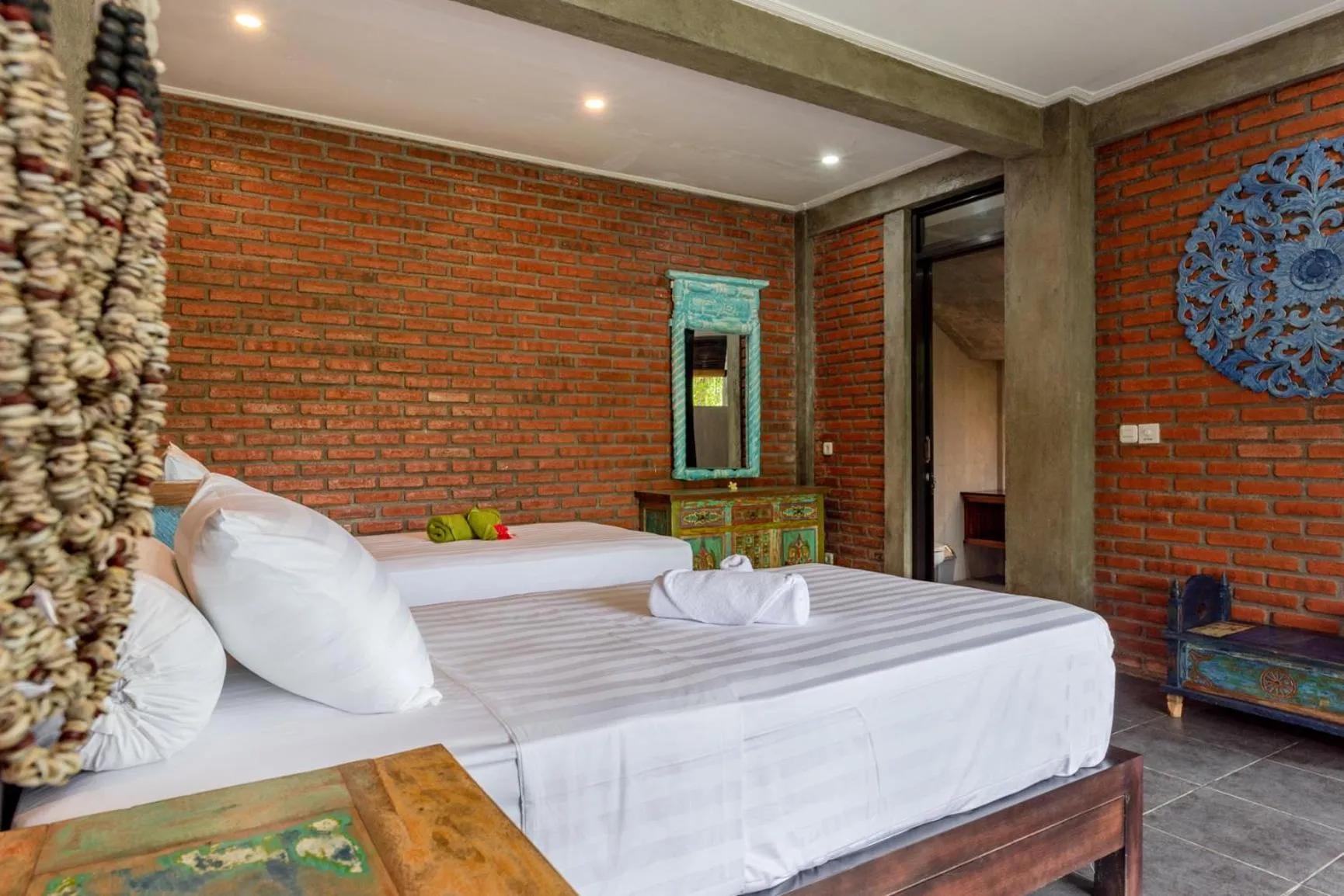 Bed in Alamanda Lovina Resort