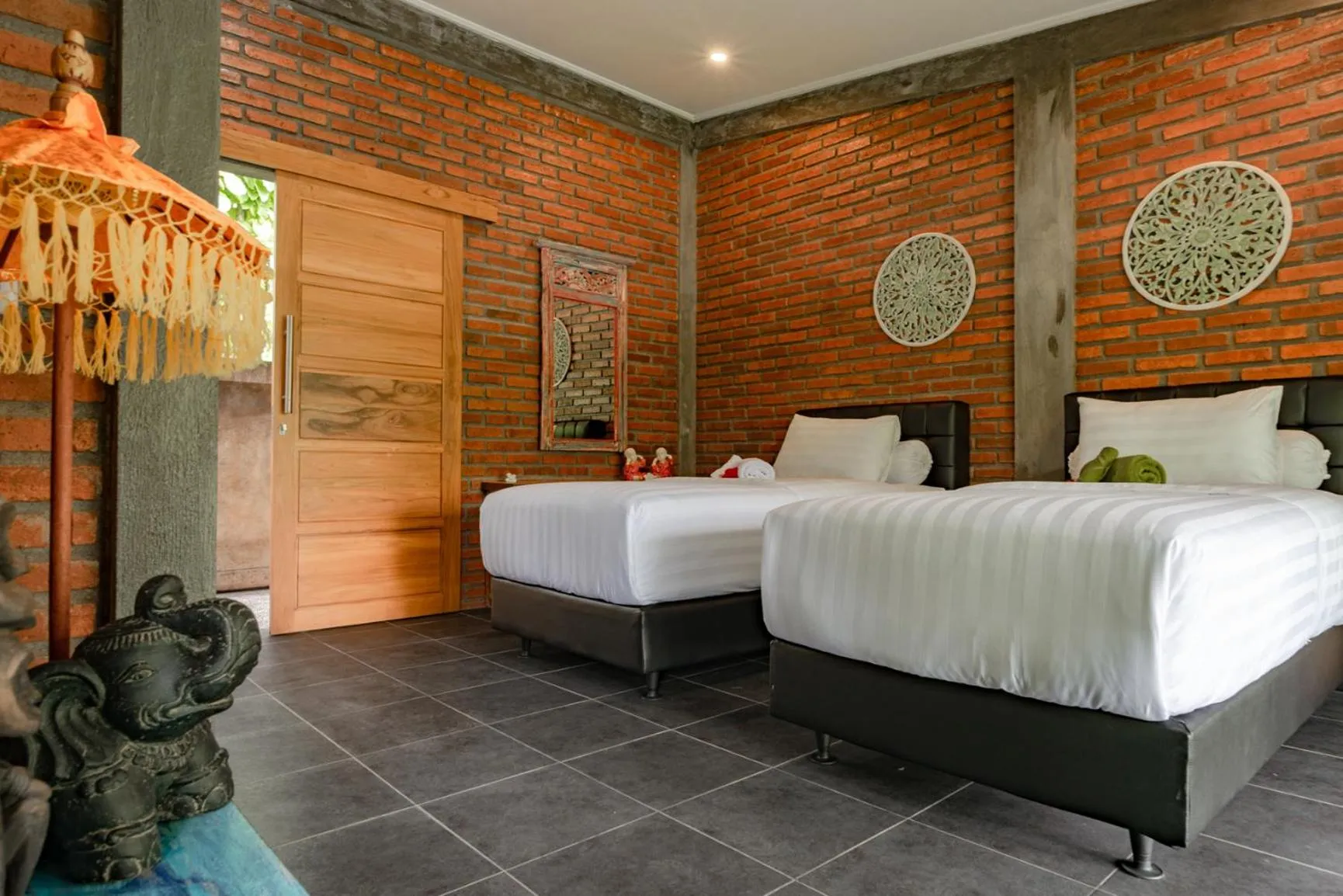 Bed in Alamanda Lovina Resort