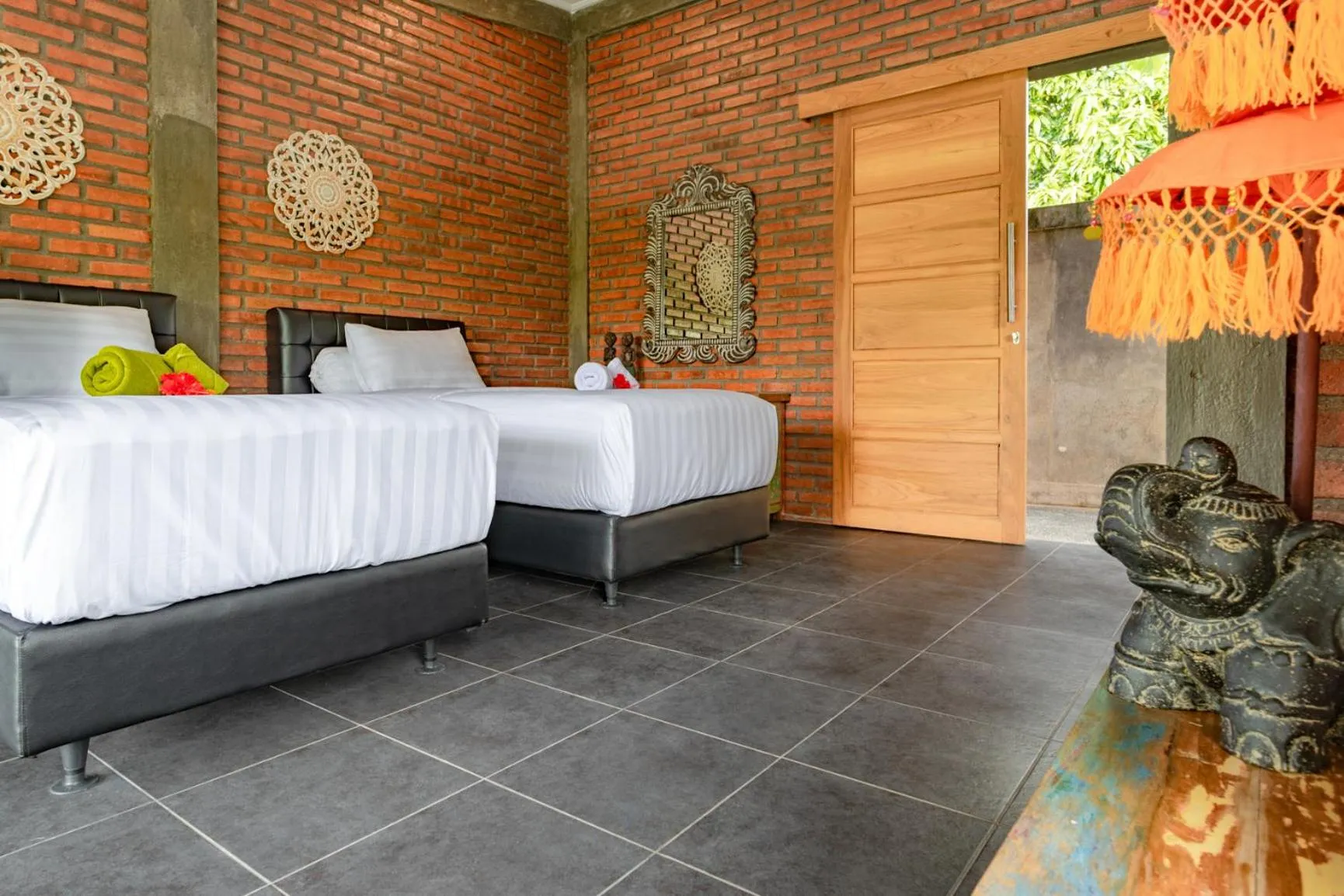 Bed in Alamanda Lovina Resort