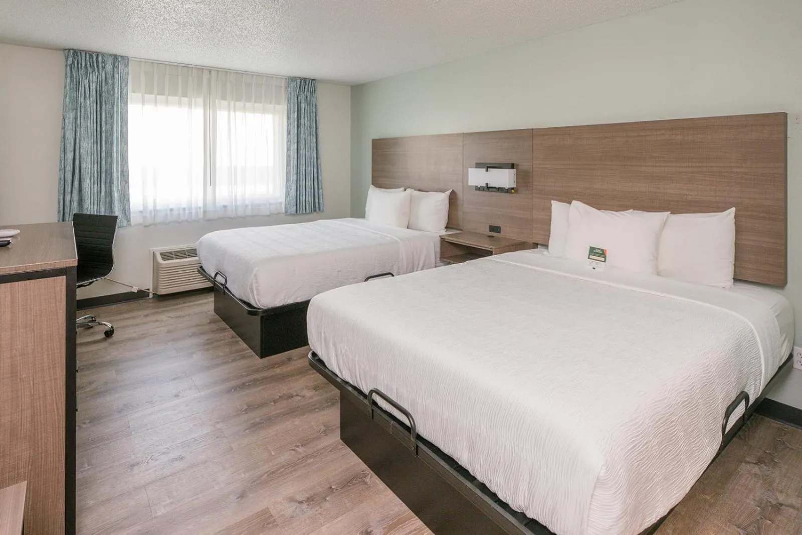 Bed in Hotel Pommier Chariton