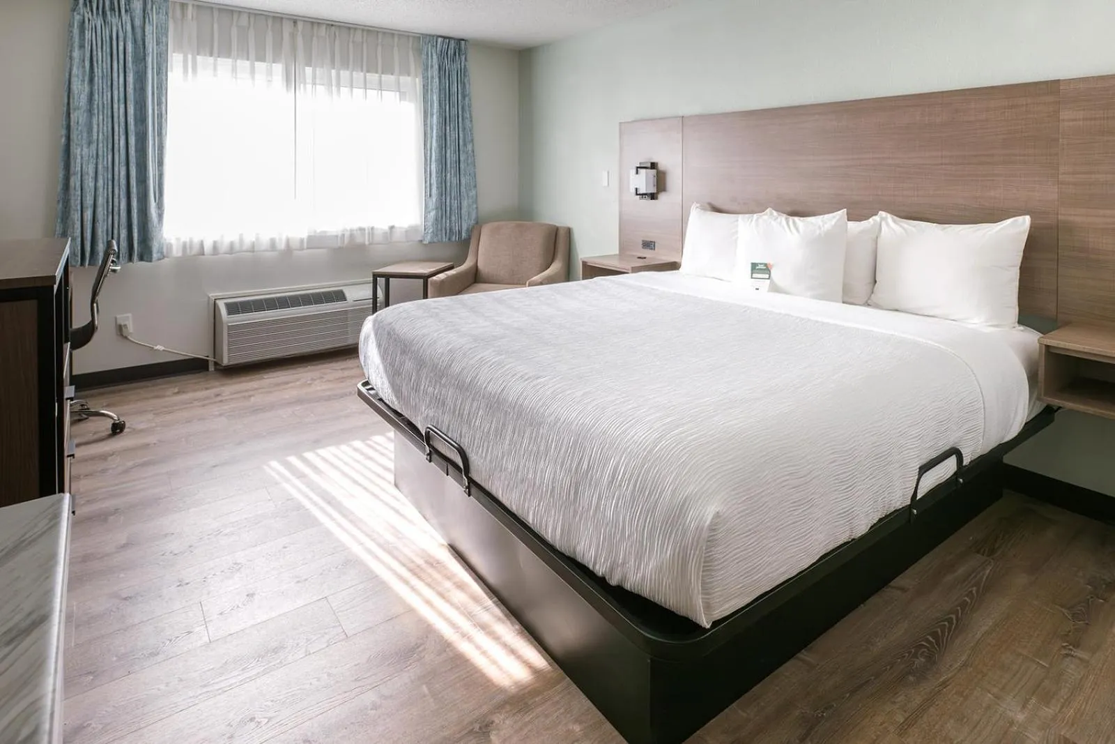 Bed in Hotel Pommier Chariton