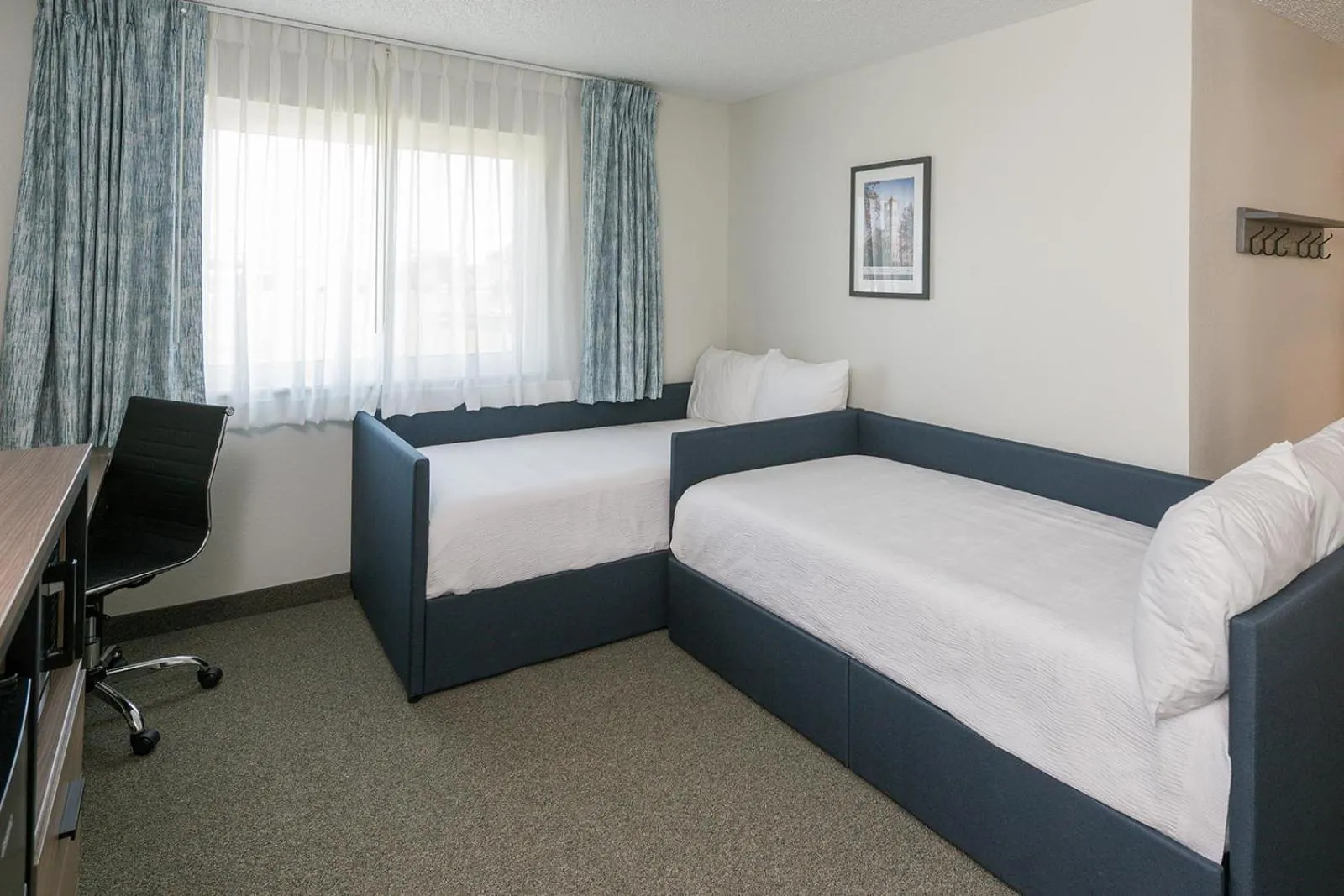 Bed in Hotel Pommier Chariton