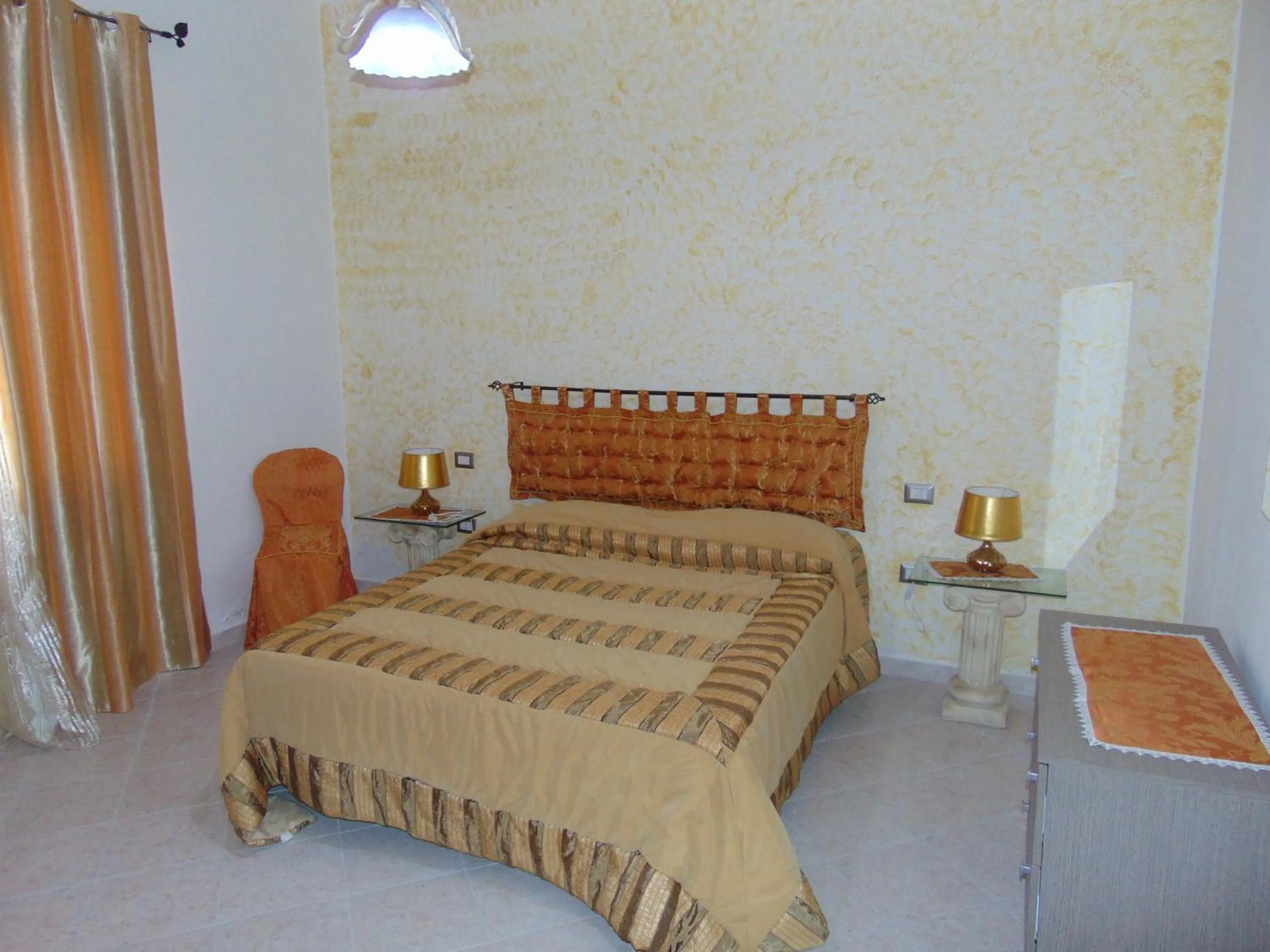 Bed in Appartamenti Budoni