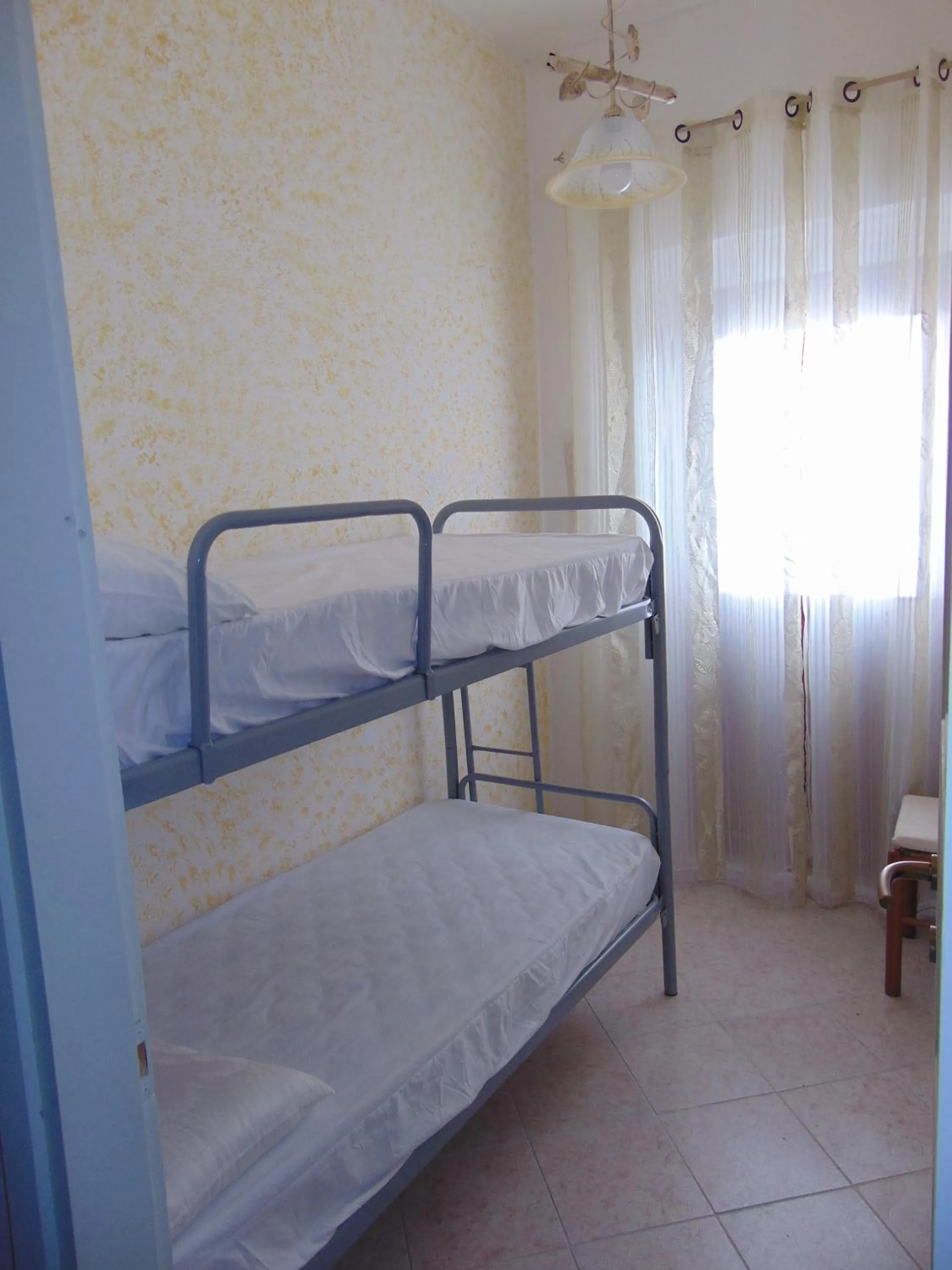 Bed in Appartamenti Budoni