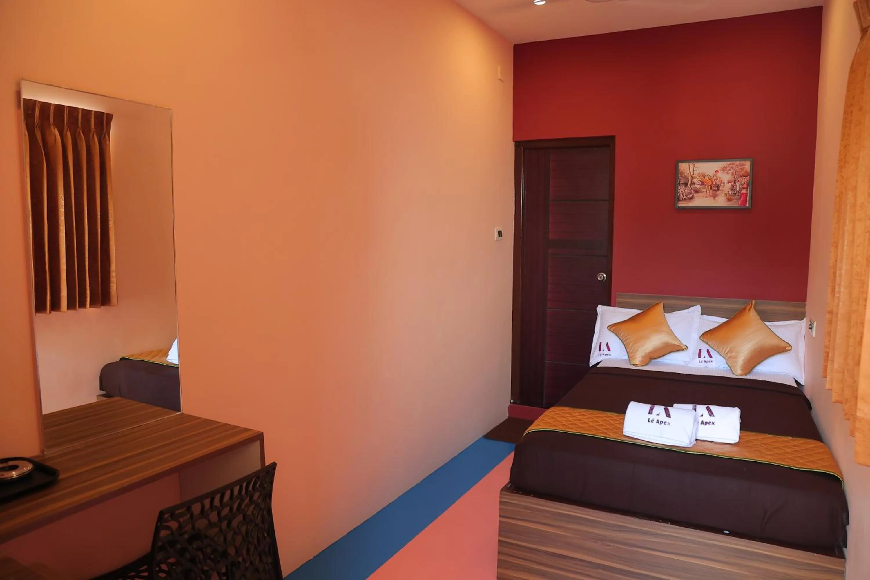 Bed in Le Apex Tharavaadu