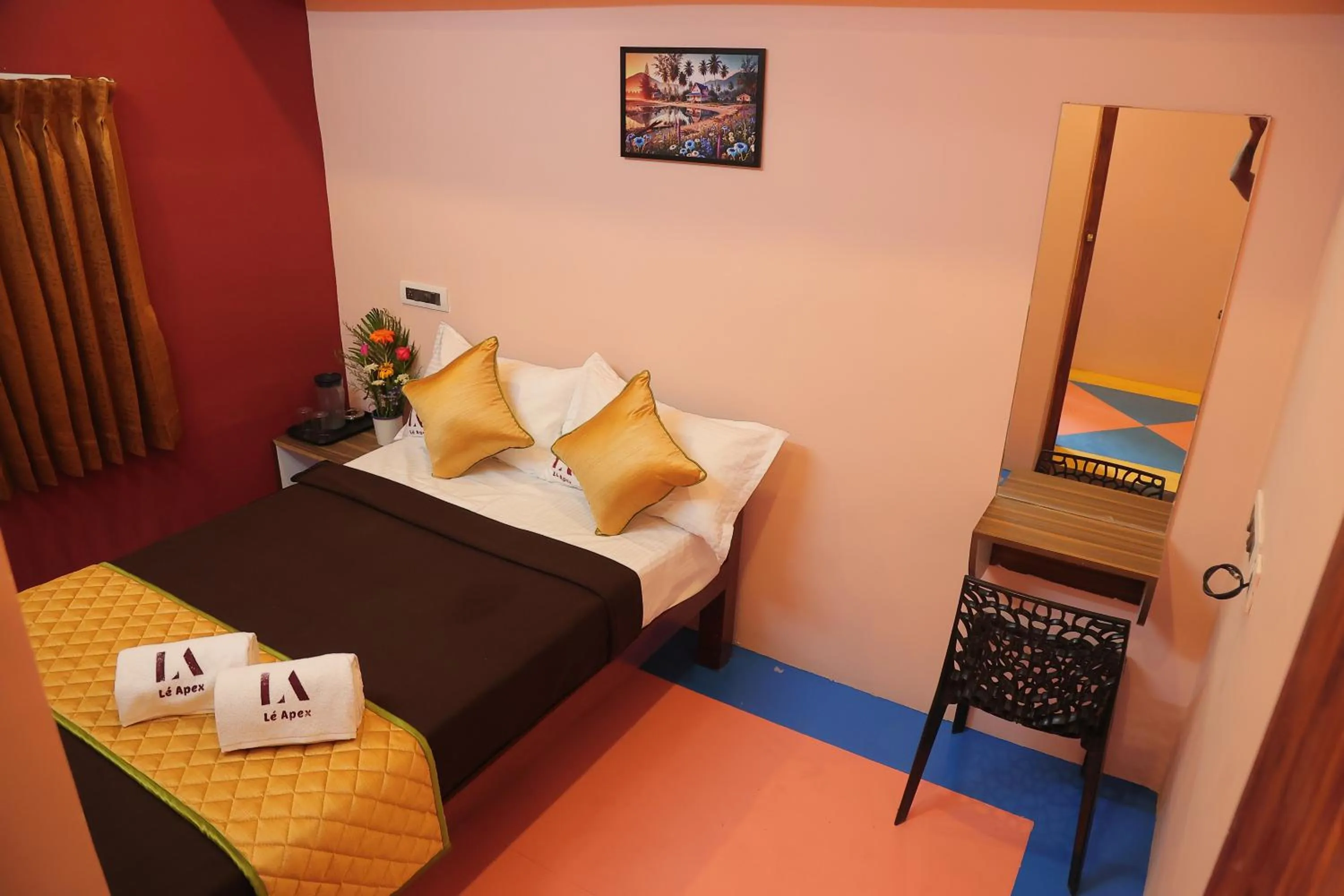 Bed in Le Apex Tharavaadu