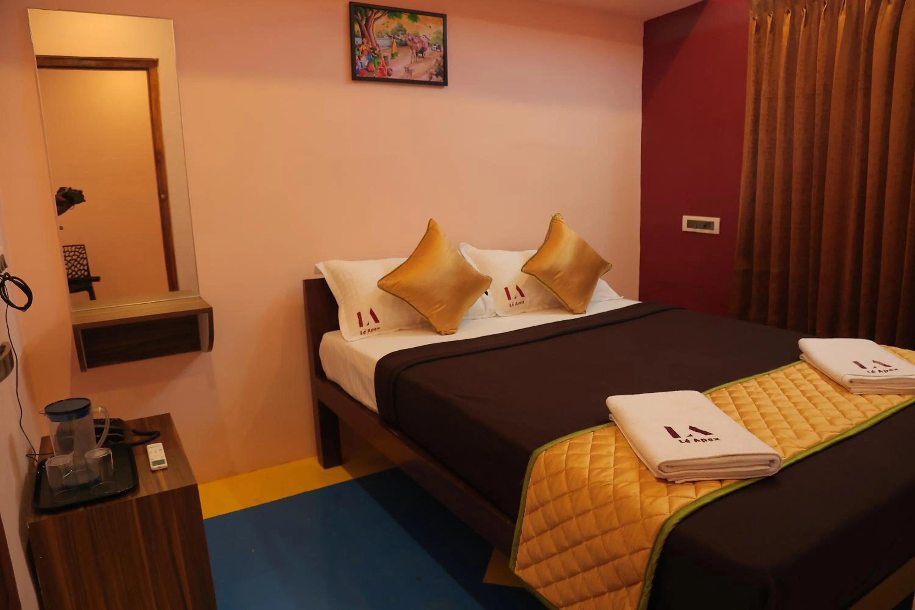 Bed in Le Apex Tharavaadu