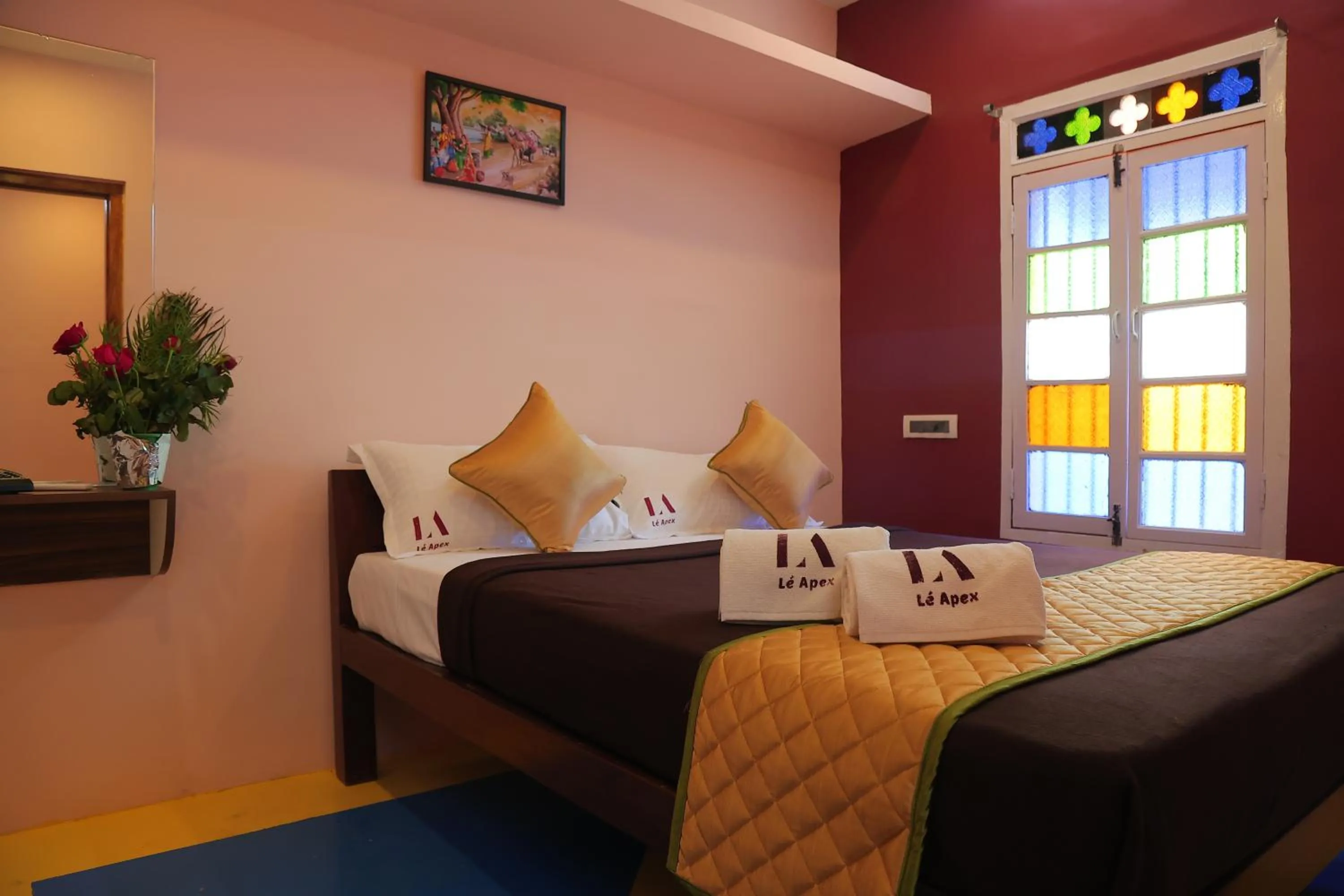 Bed in Le Apex Tharavaadu