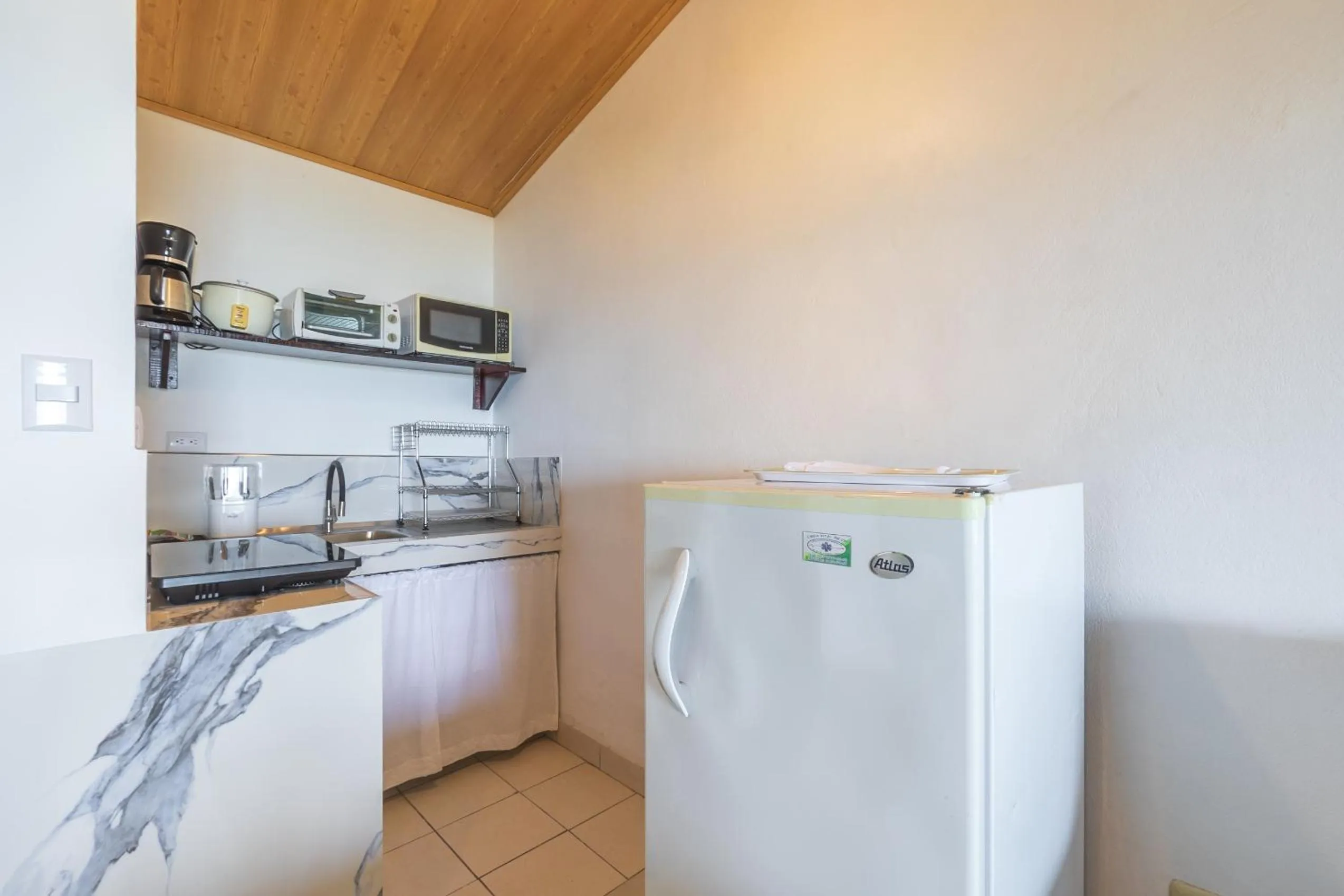 Kitchen or kitchenette in Hotel Villas de la Selva