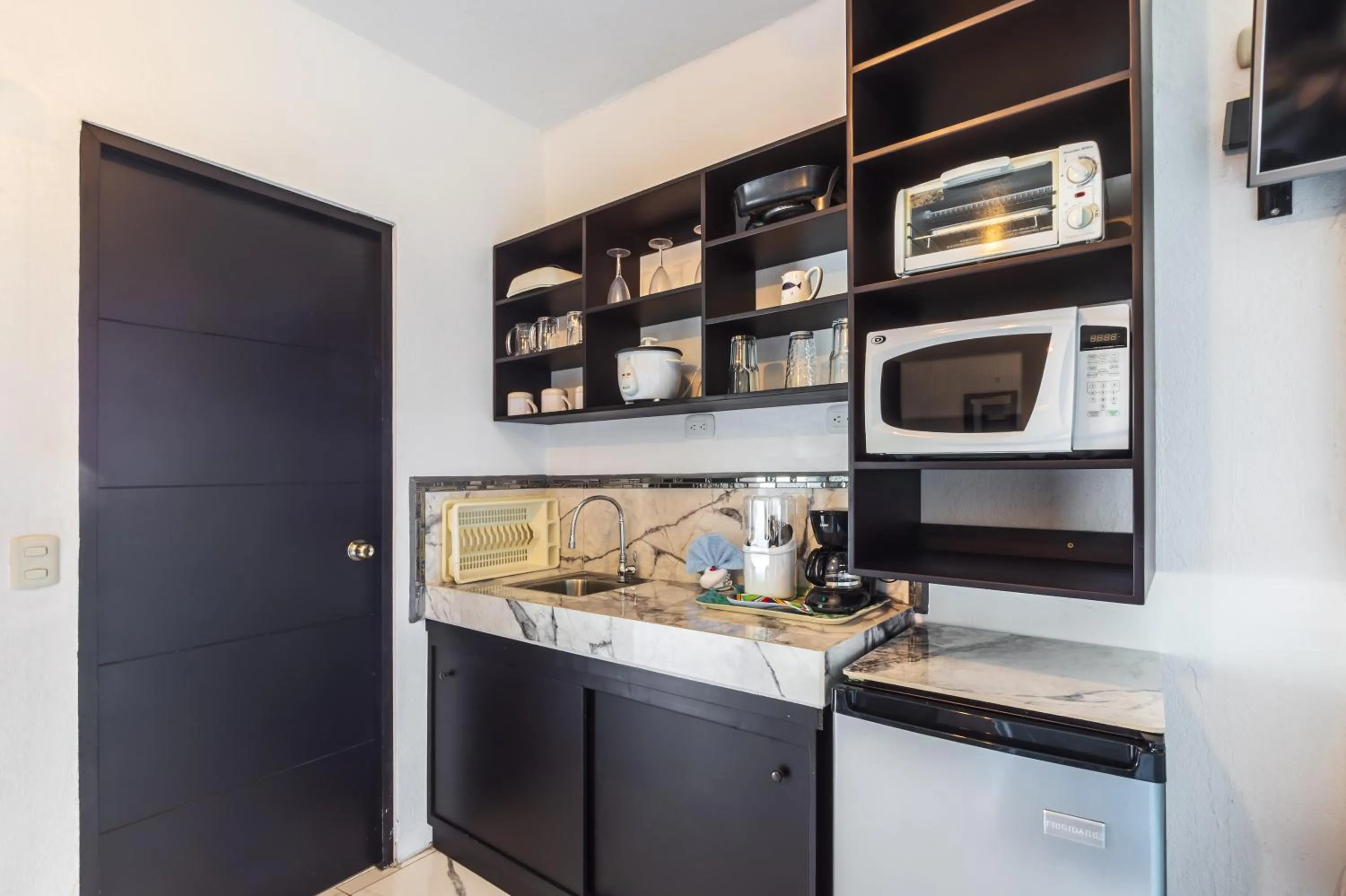 Kitchen or kitchenette in Hotel Villas de la Selva