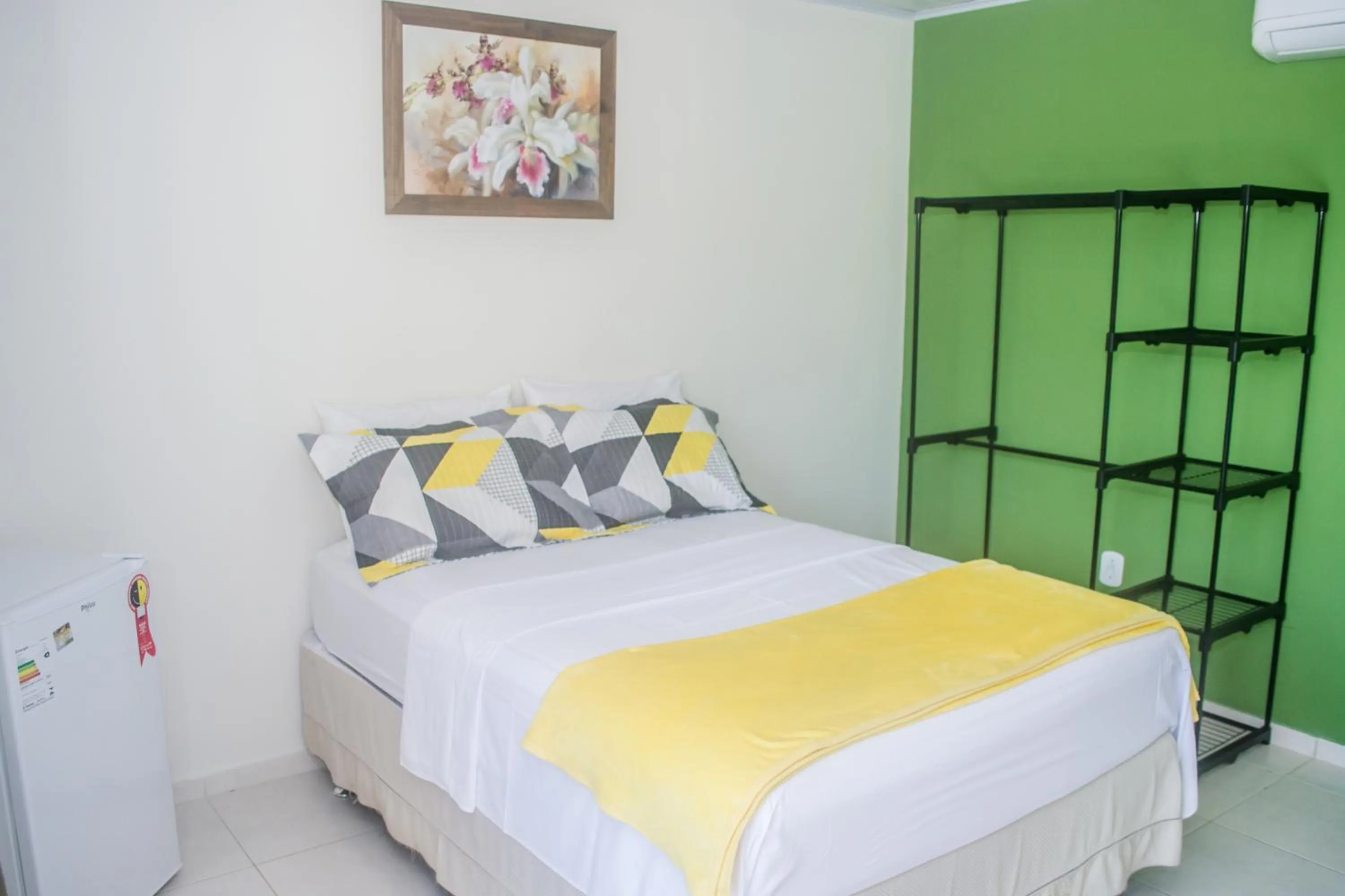 Bed in Pousada Paraíso das Palmeiras