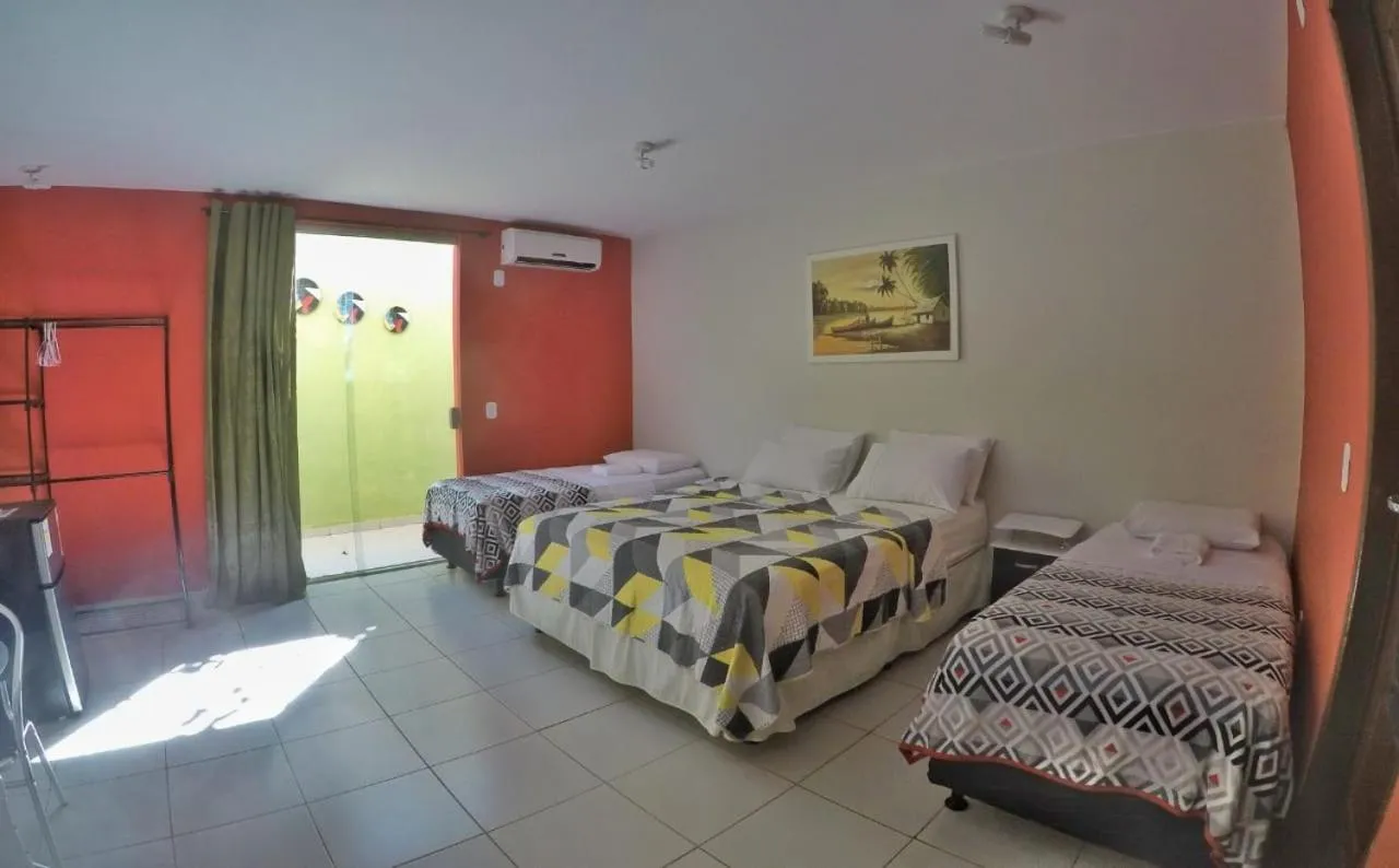 Bed in Pousada Paraíso das Palmeiras