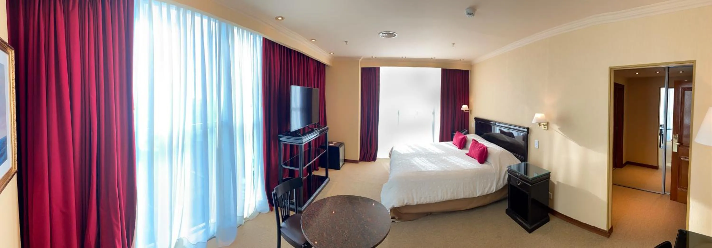 Bed in Status Hotel