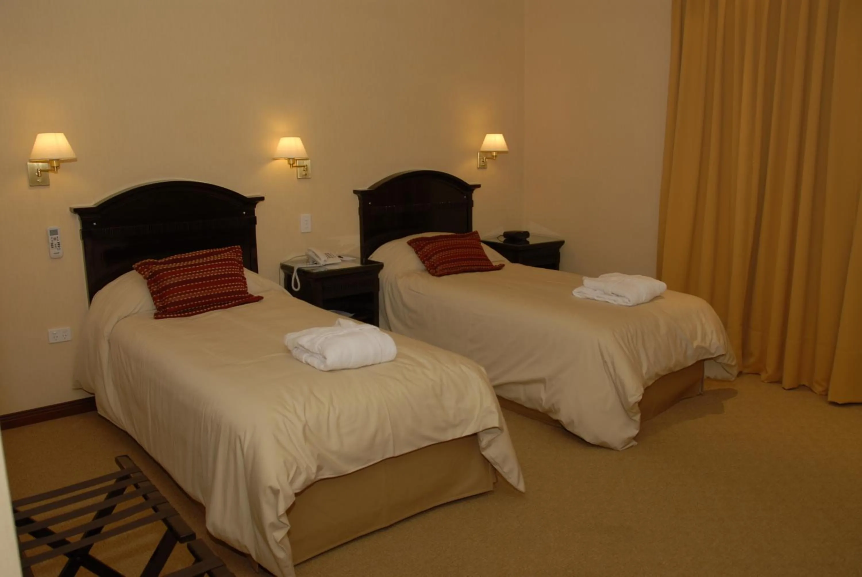 Bed in Status Hotel
