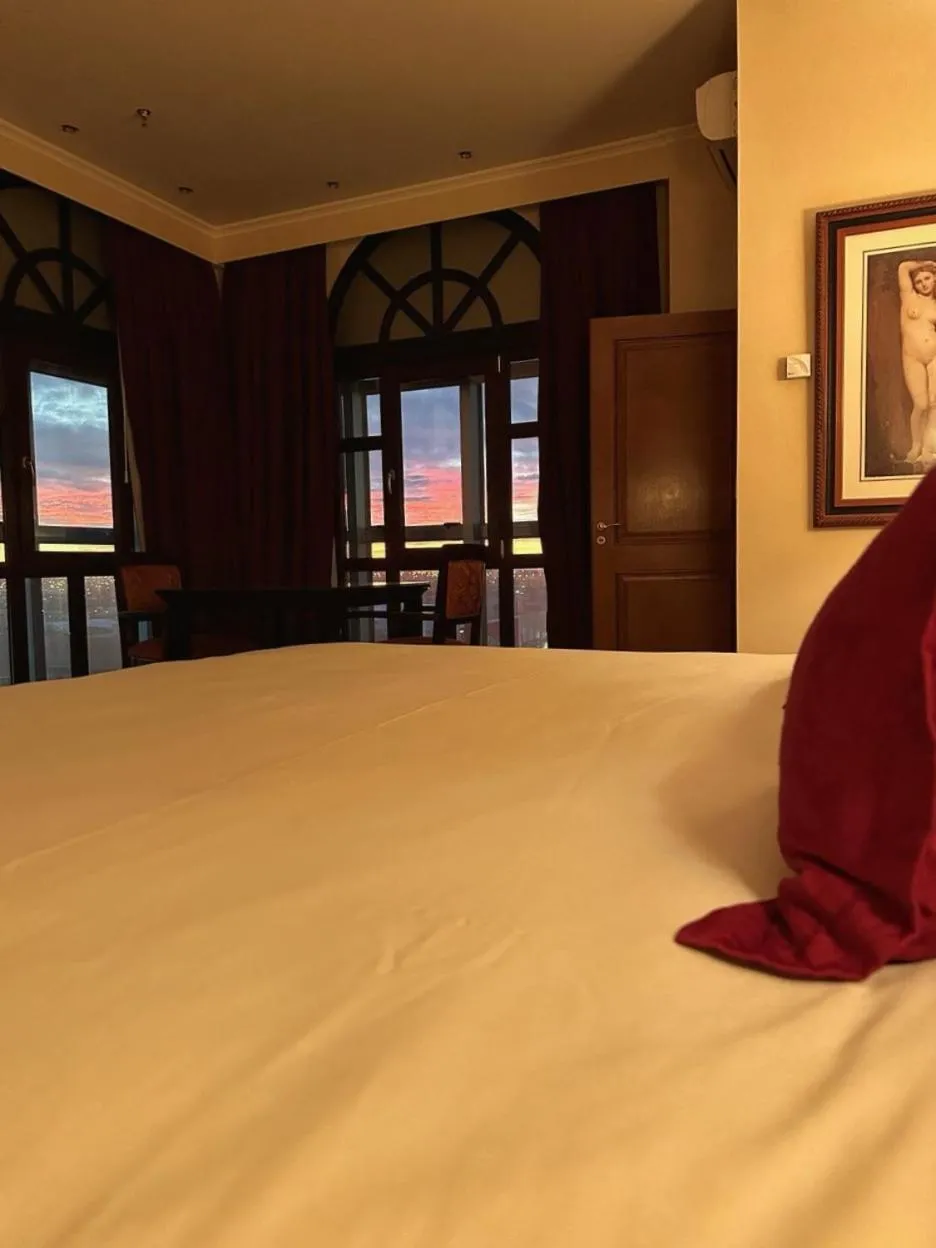 Photo of the whole room, Bed in Status Hotel