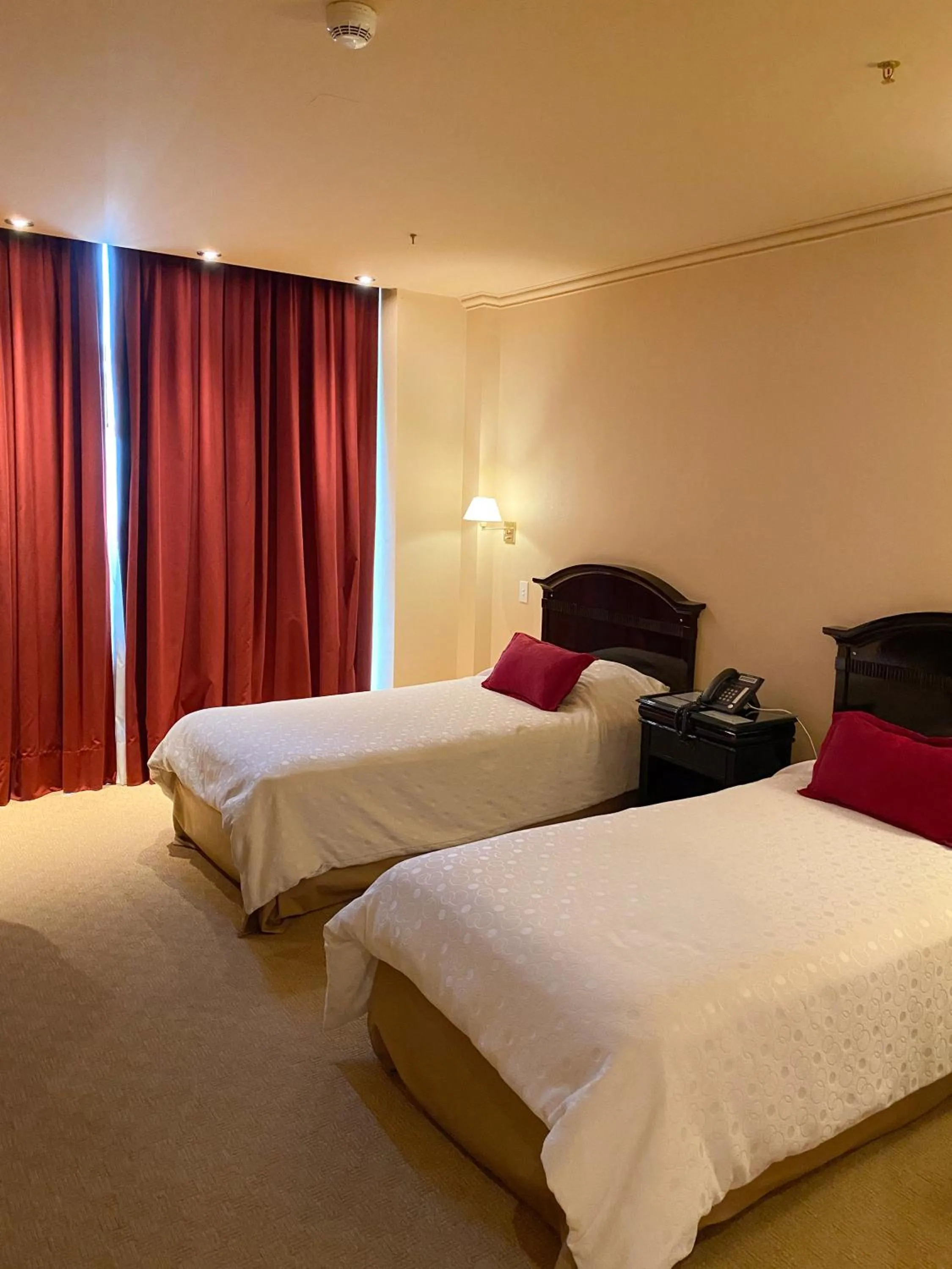 Bed in Status Hotel
