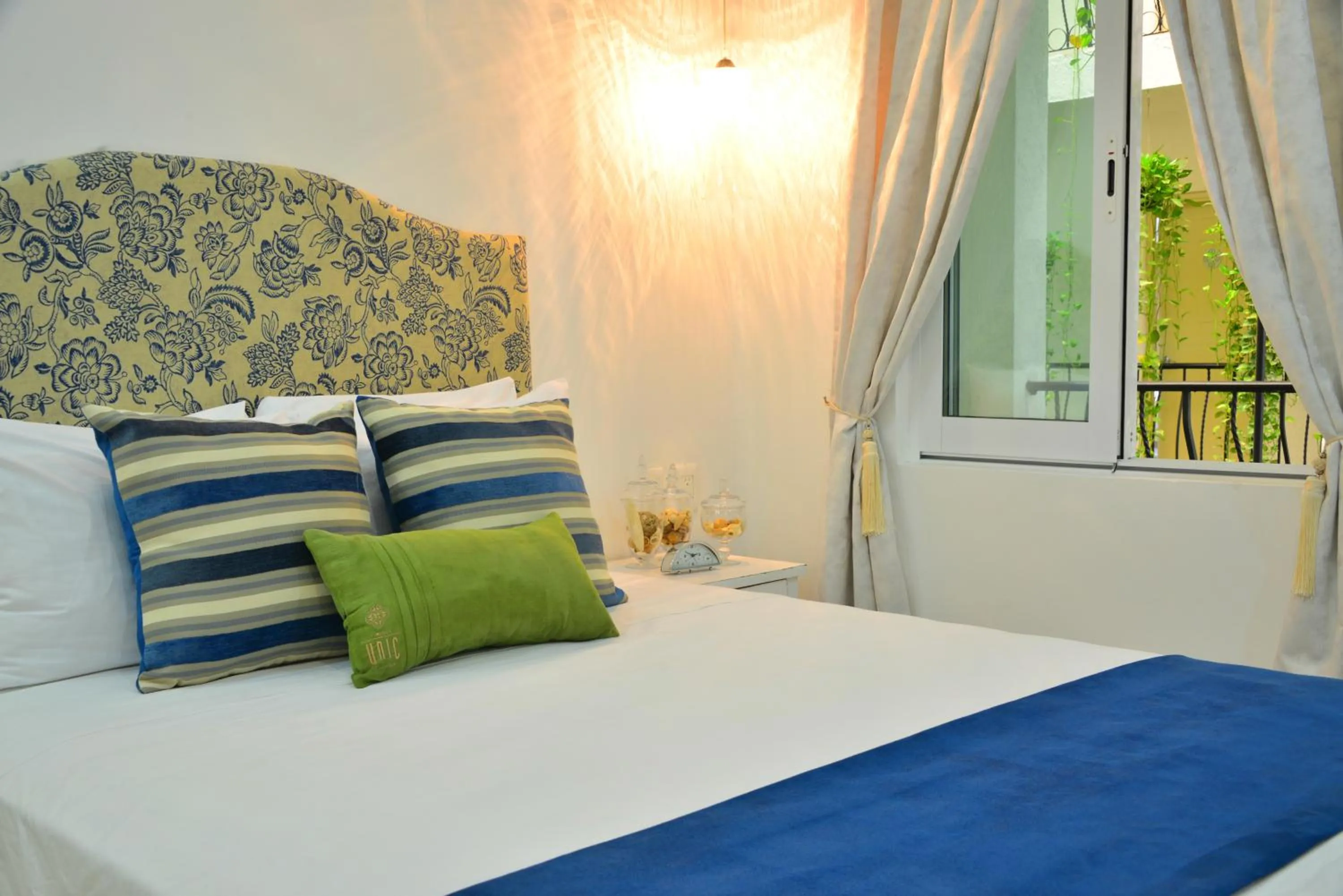 Bed in Unic Design Hotel & Restaurant- 5th Avenue