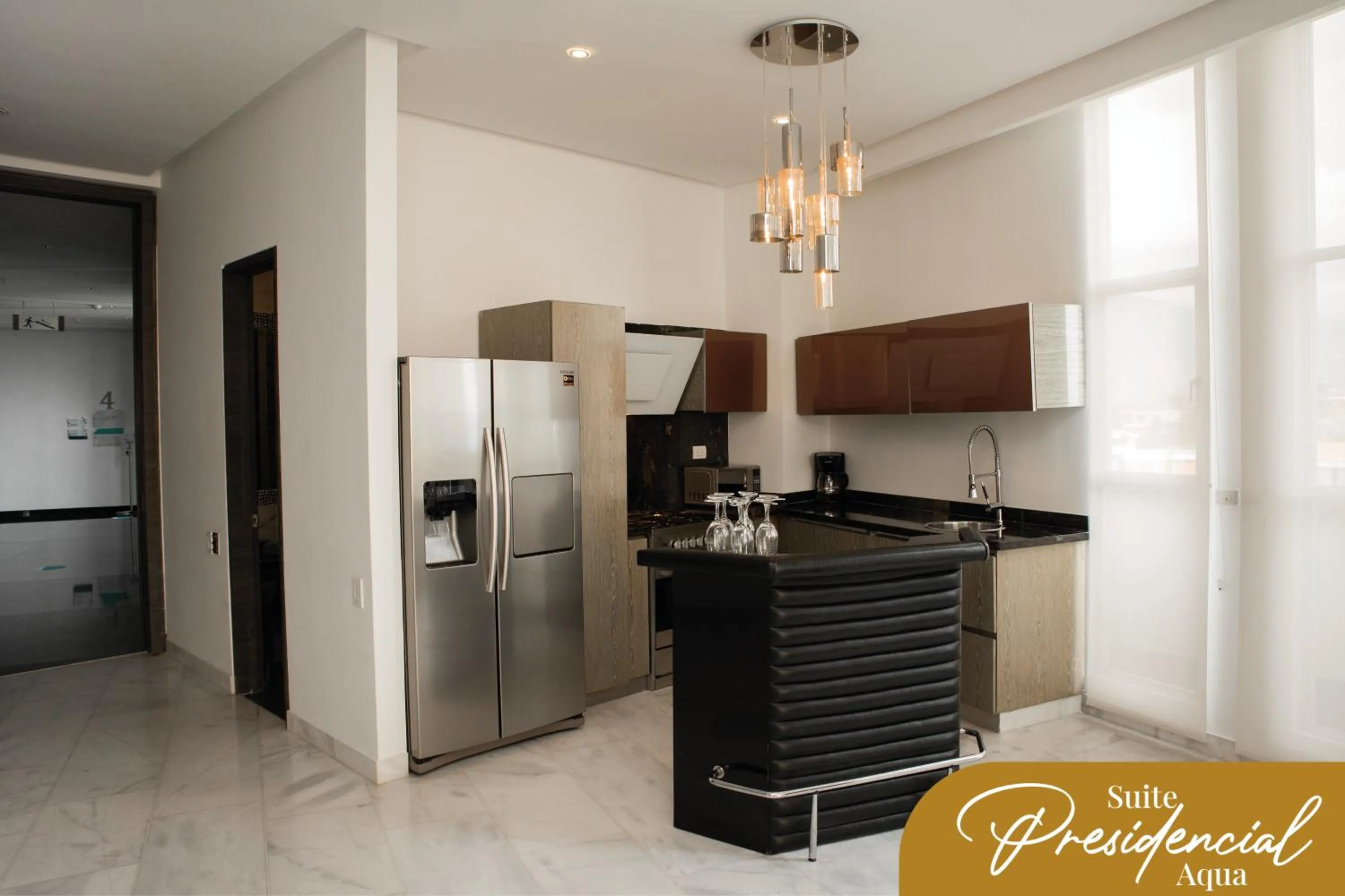 Kitchen or kitchenette in Punta Diamante Premium Hotel