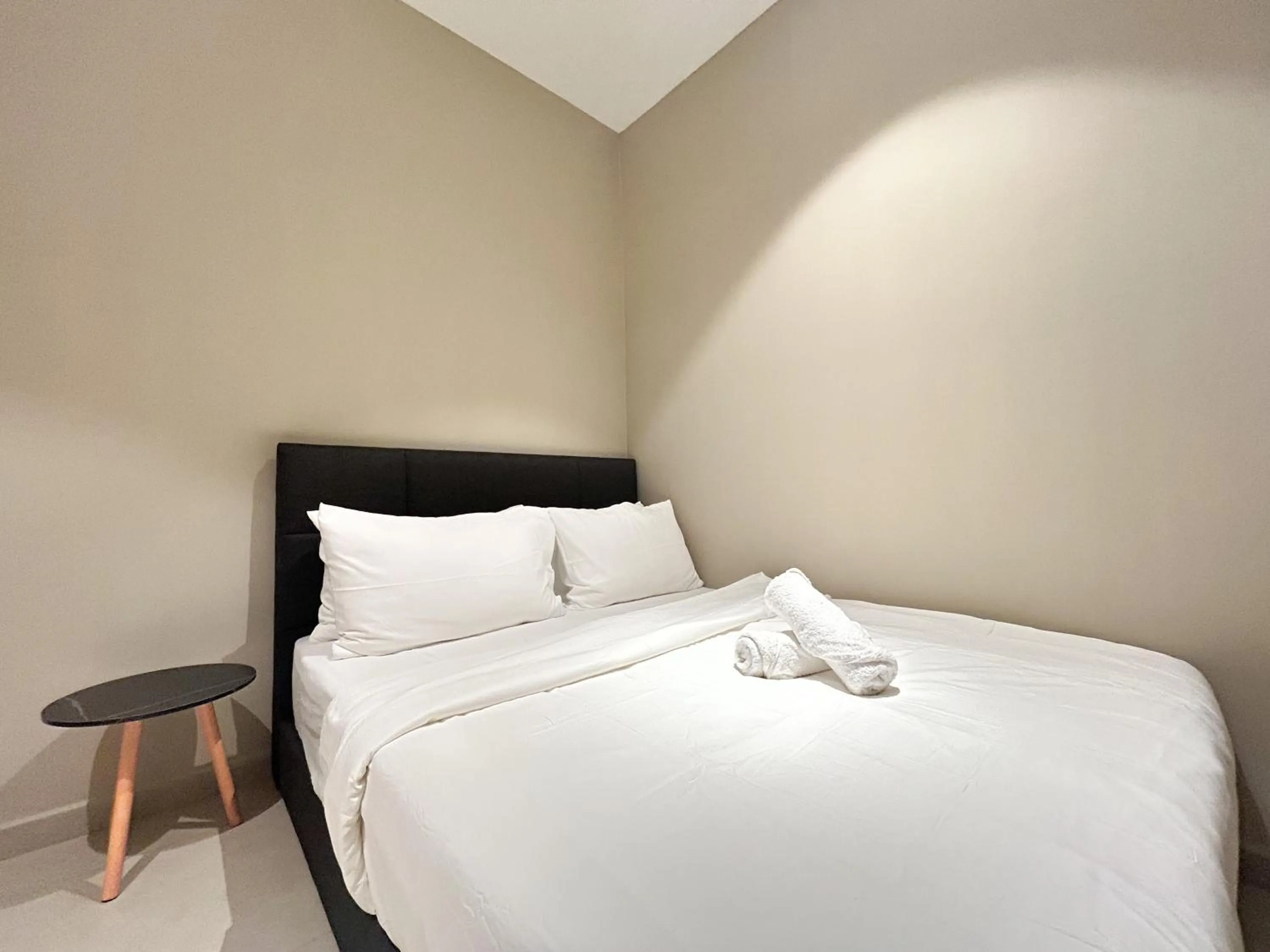 Bed in The Paxtonz by Manhattan Group