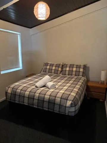 Bed in Altitude Apartments