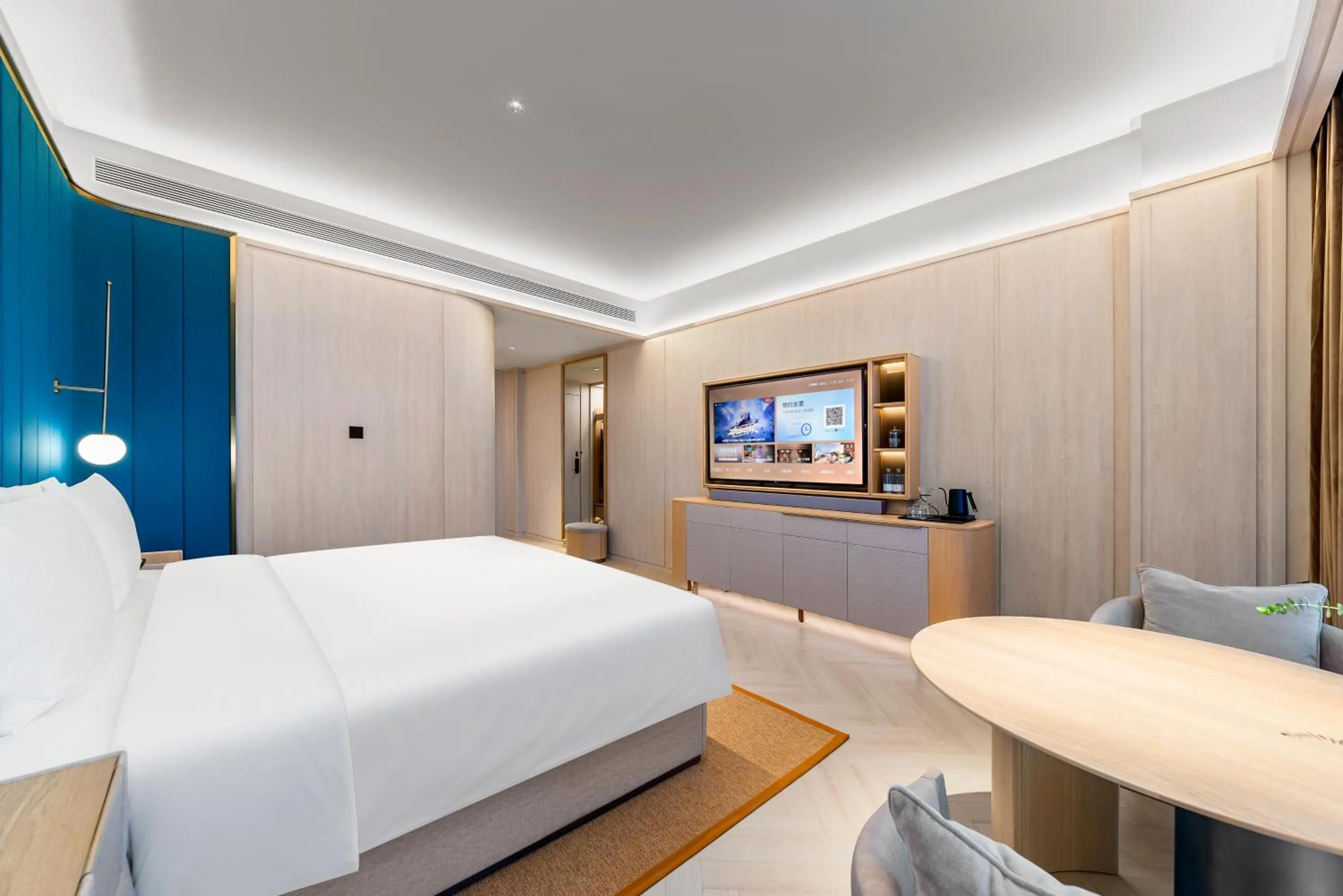 Bed in Orange Crystal High-tech Convention and Exhibition Center Hotel