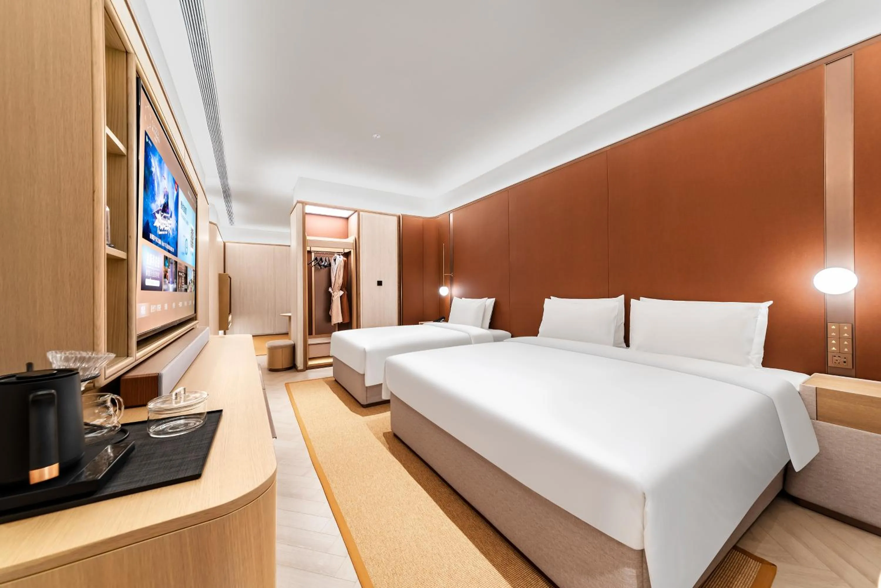 Bed in Orange Crystal High-tech Convention and Exhibition Center Hotel