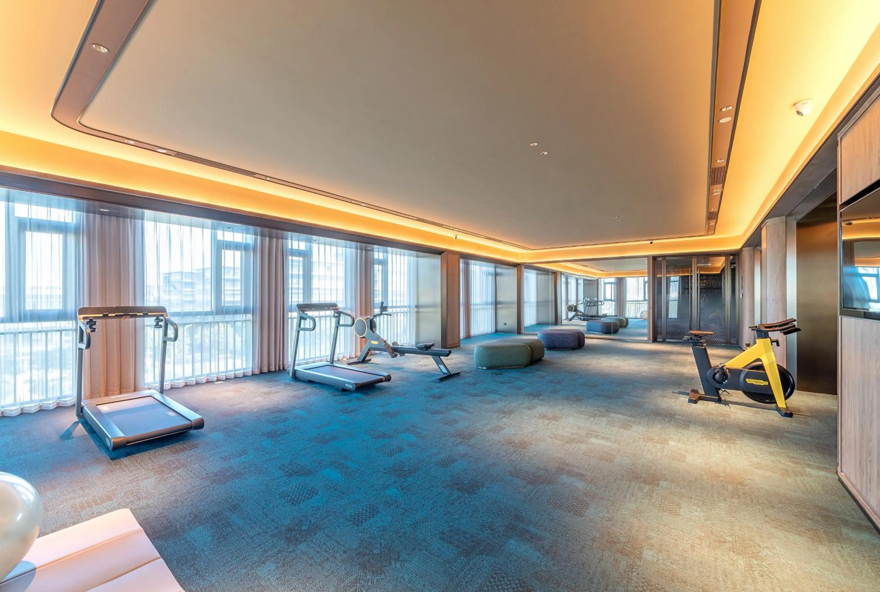 Fitness centre/facilities in Orange Crystal High-tech Convention and Exhibition Center Hotel