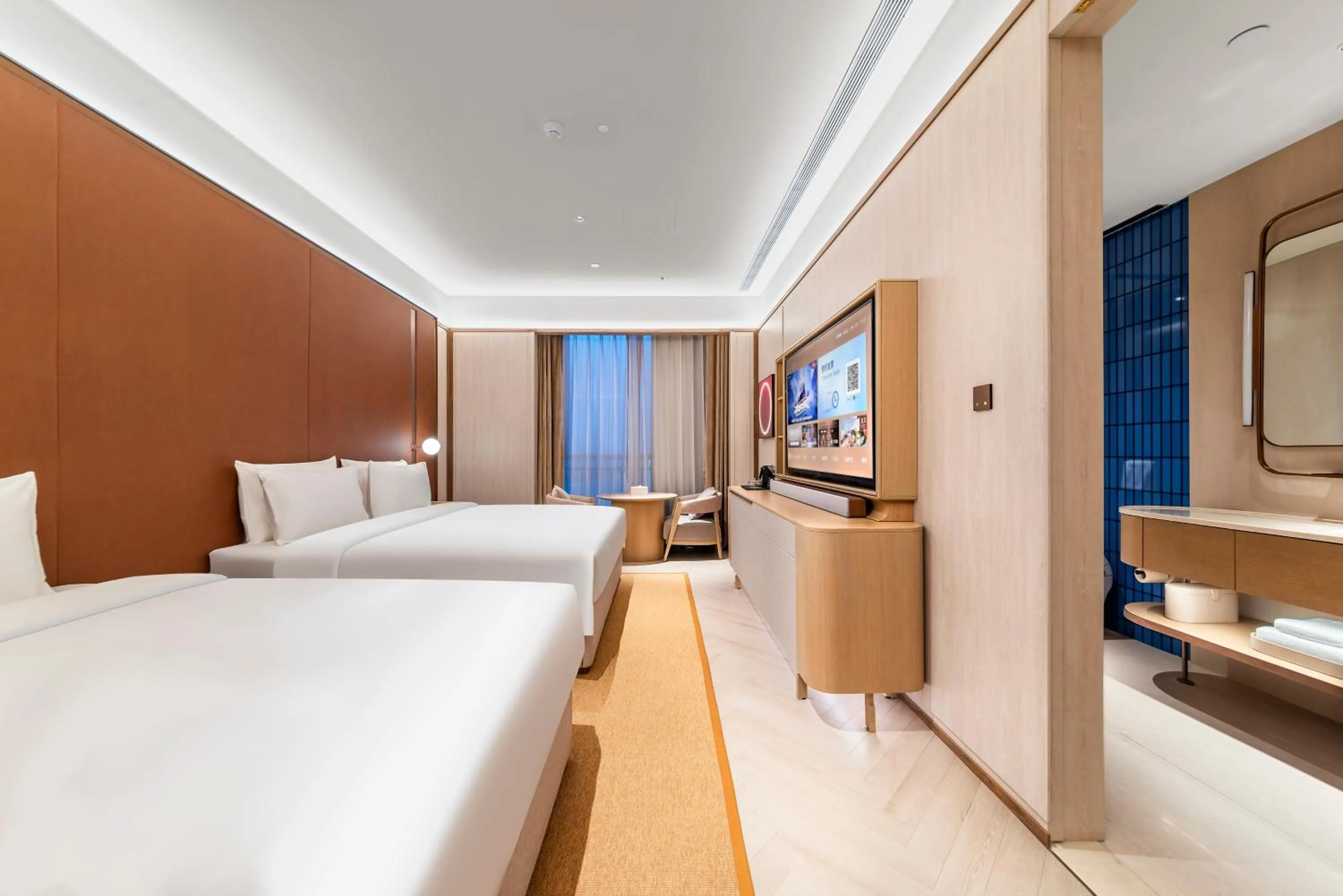 Bed in Orange Crystal High-tech Convention and Exhibition Center Hotel