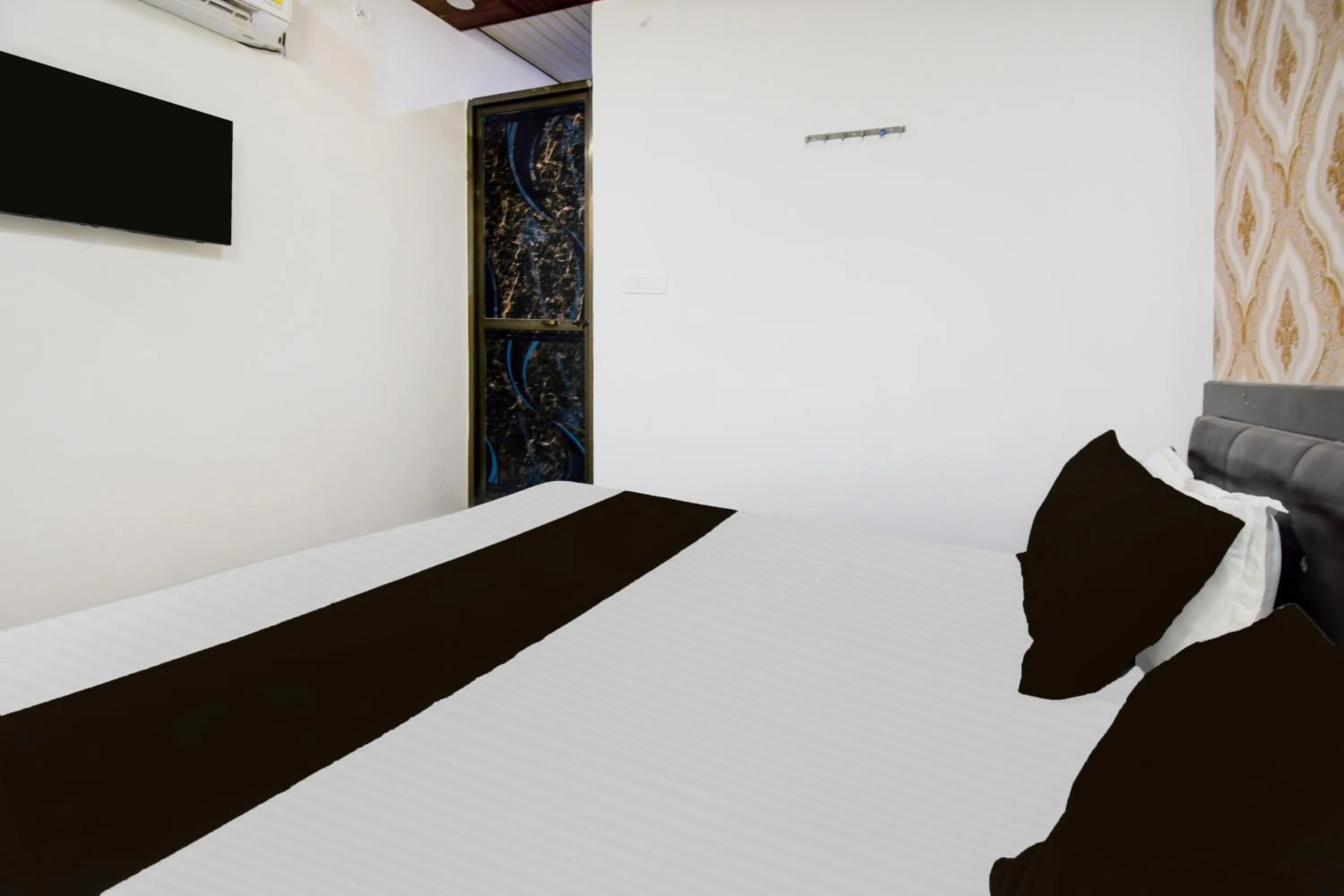 Bedroom, Bed in Super Hotel O Ambedkar Park Gorakhpur Formerly Mayur Residency