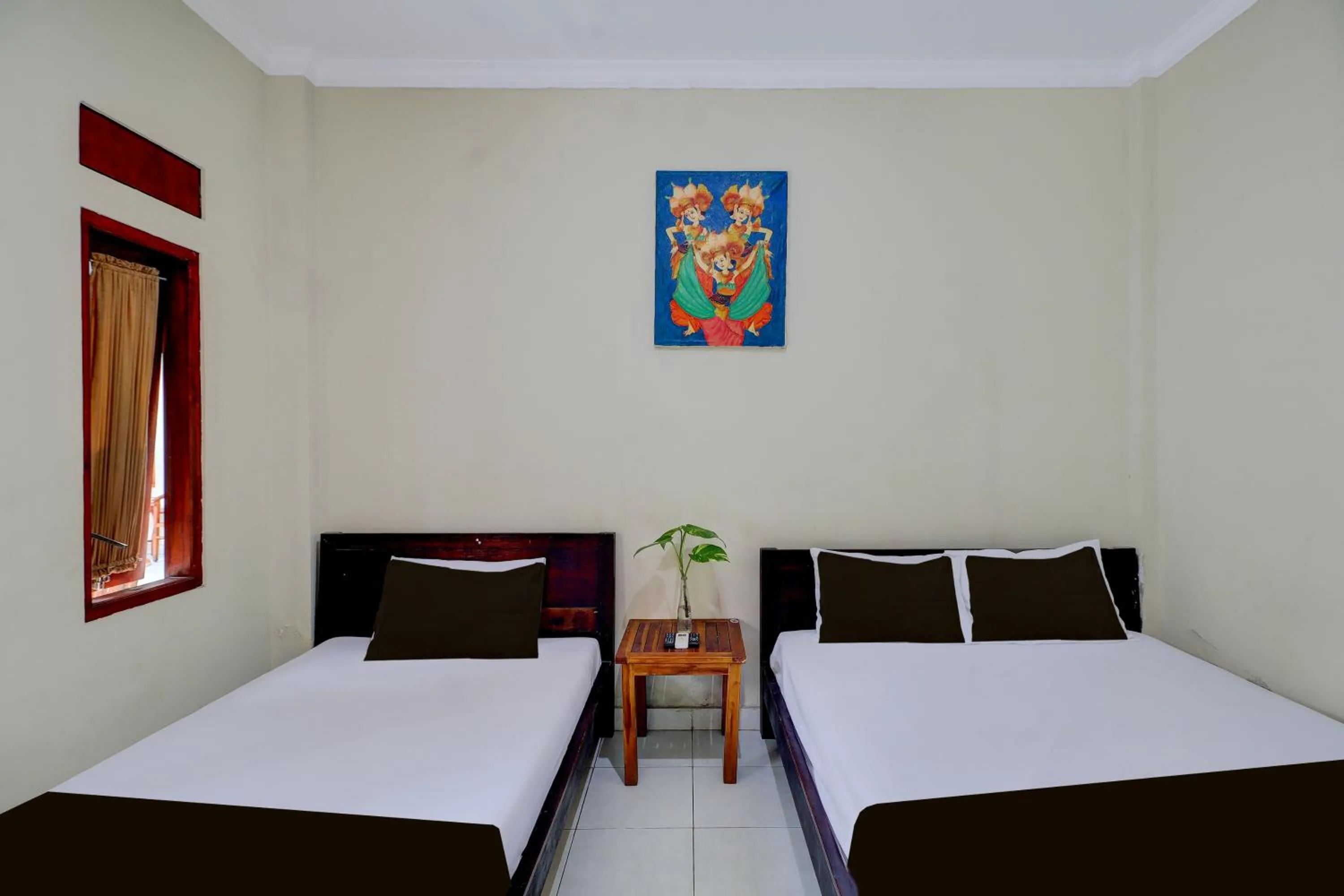 Photo of the whole room, Bed in Collection O Budget Door Legian Inn @Poppies Road