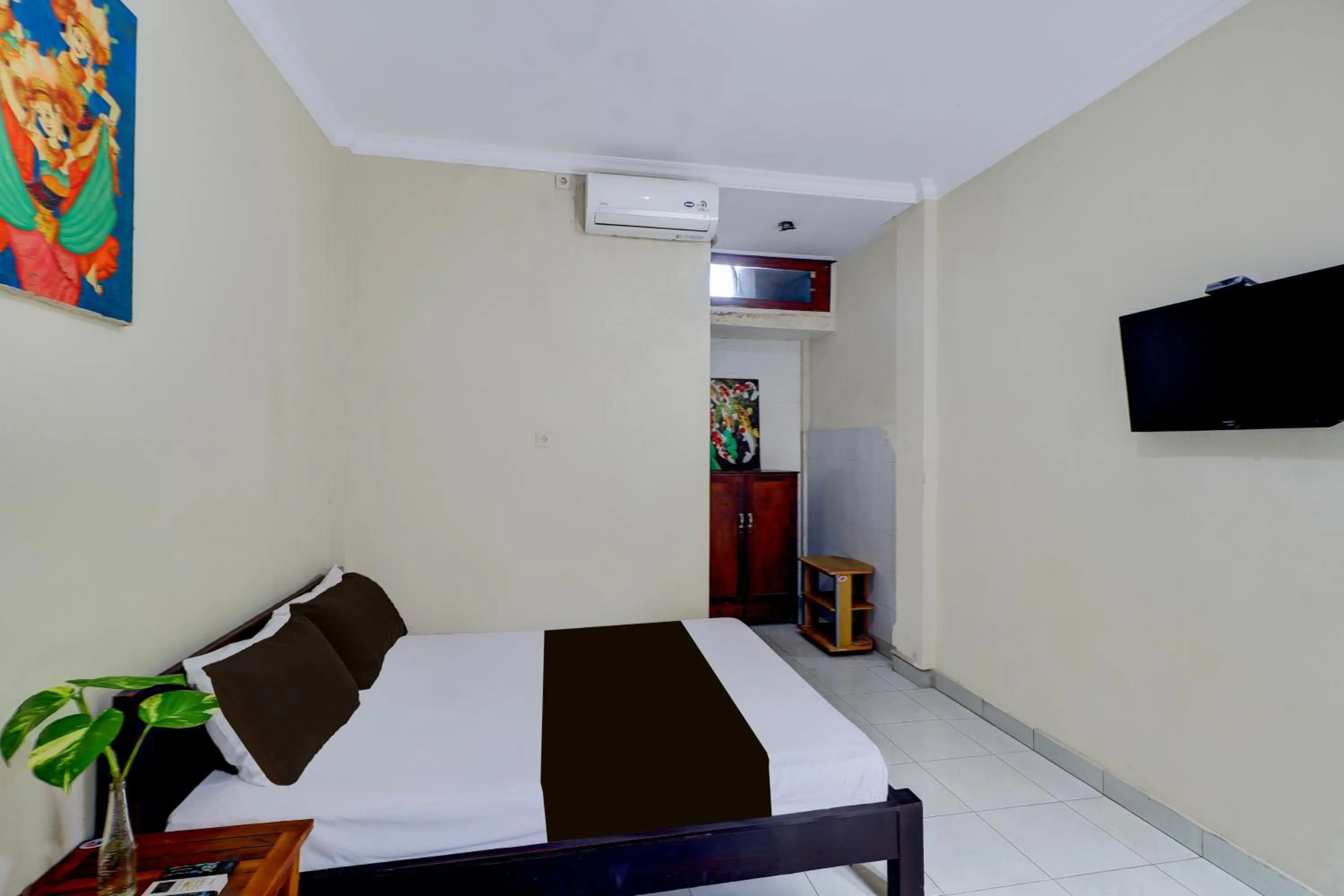 Photo of the whole room, Bed in Collection O Budget Door Legian Inn @Poppies Road