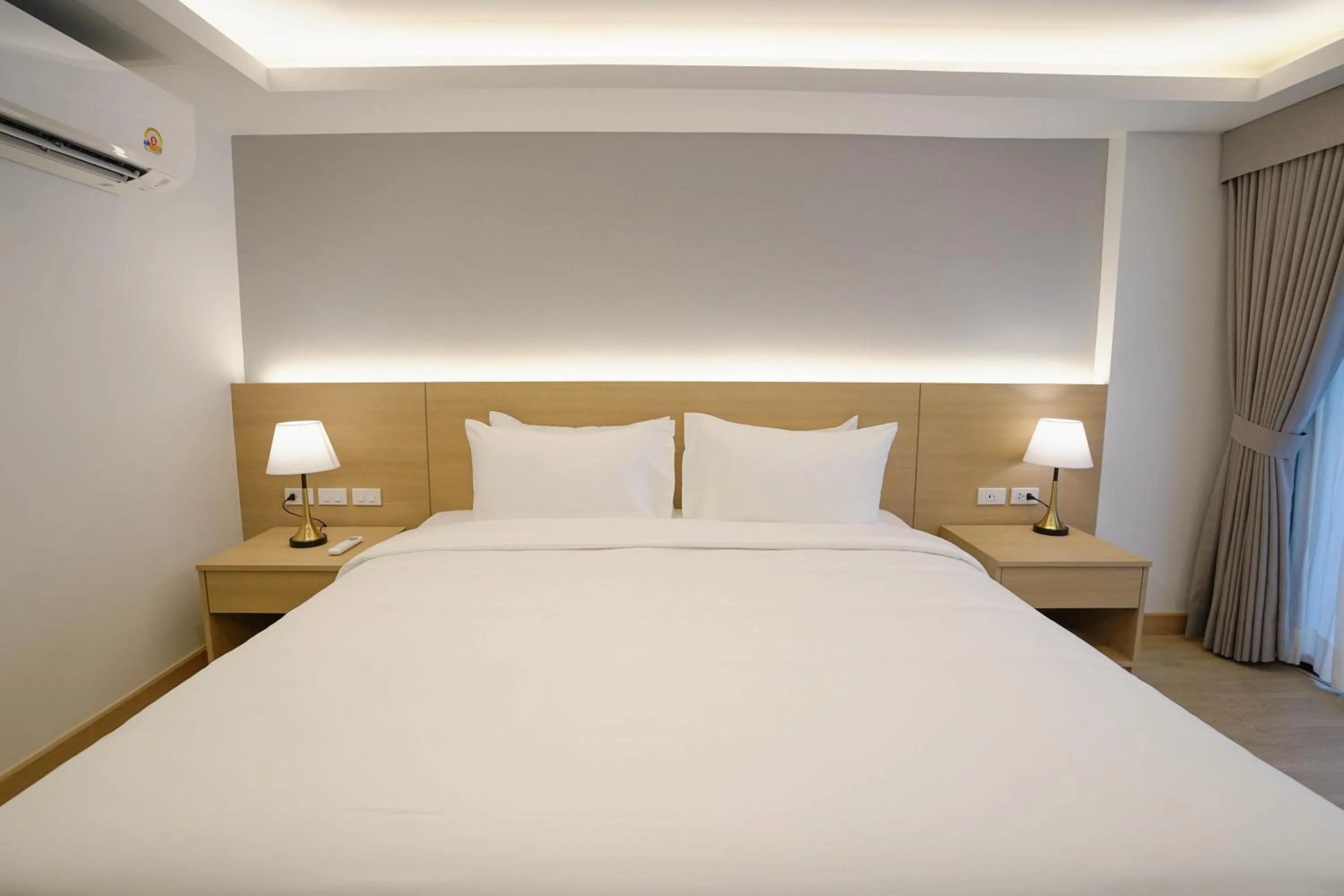 Bed in The Kite Hotel Bangsaen by Koko