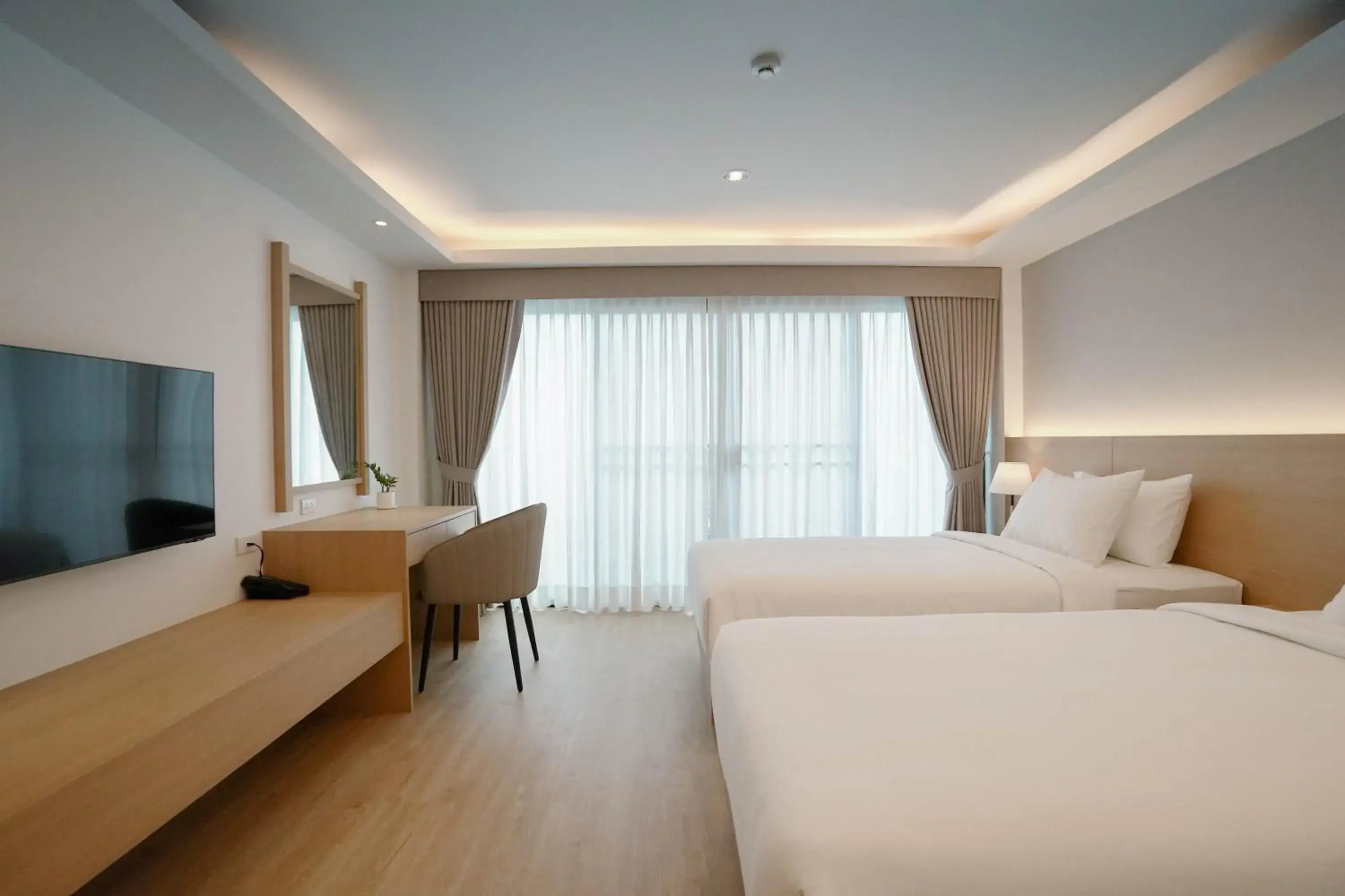 Standard Twin Room in The Kite Hotel Bangsaen by Koko Standard Twin Room in The Kite Hotel Bangsaen by Koko