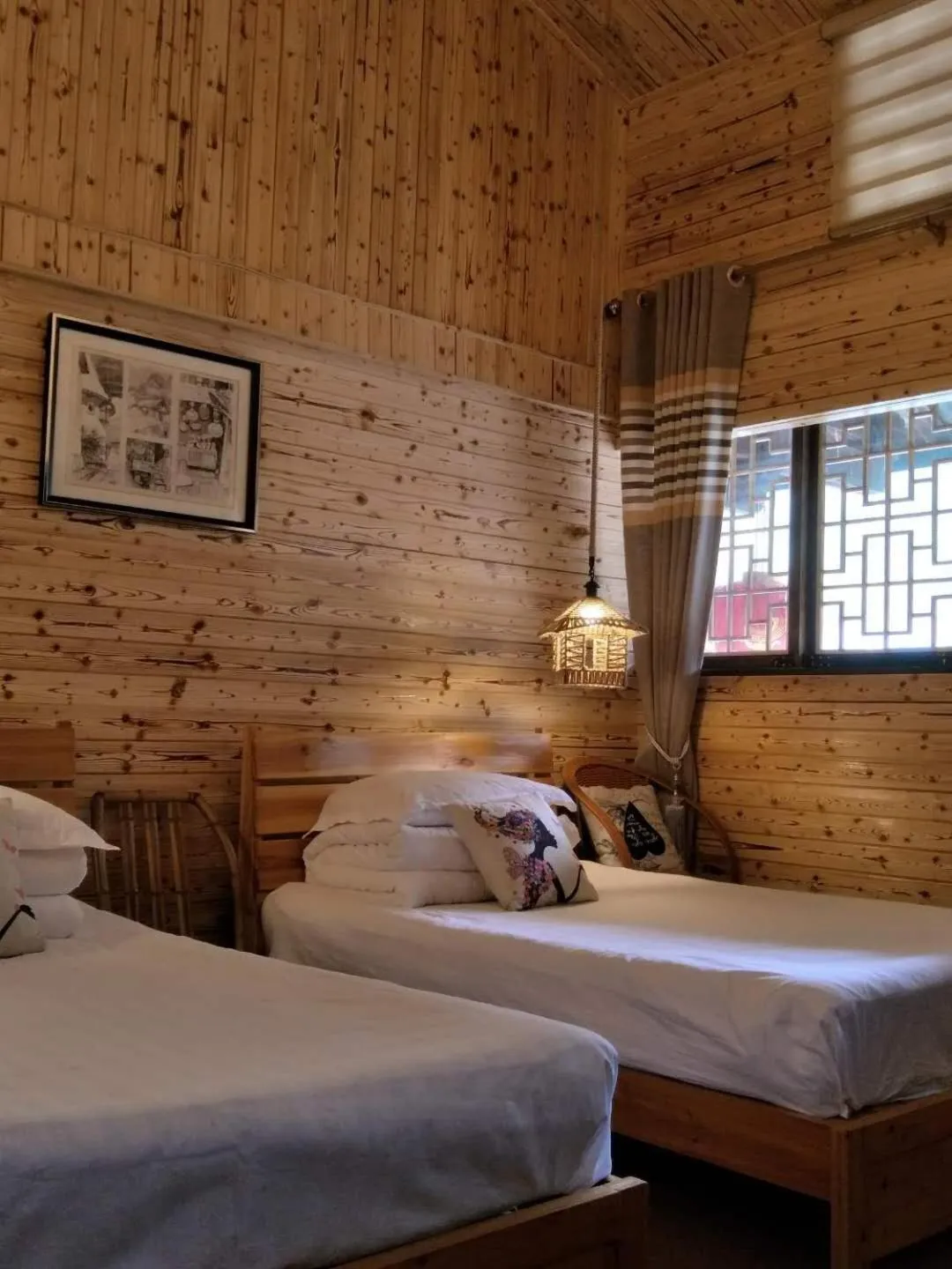 Bed in Nanjing Tulou Qingdelou Inn